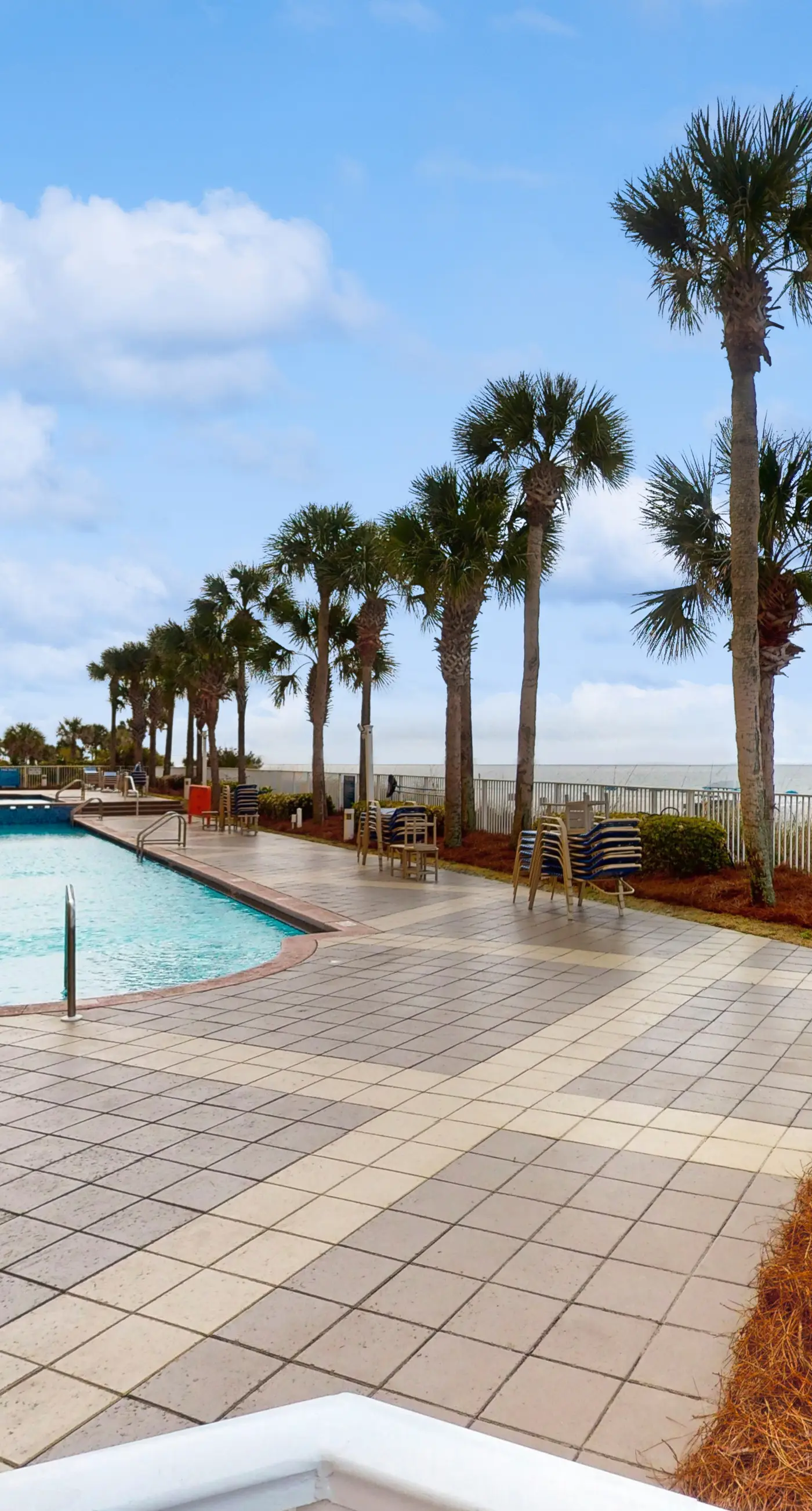 Charming, beachfront condo with furnished balcony & a bi-level pool