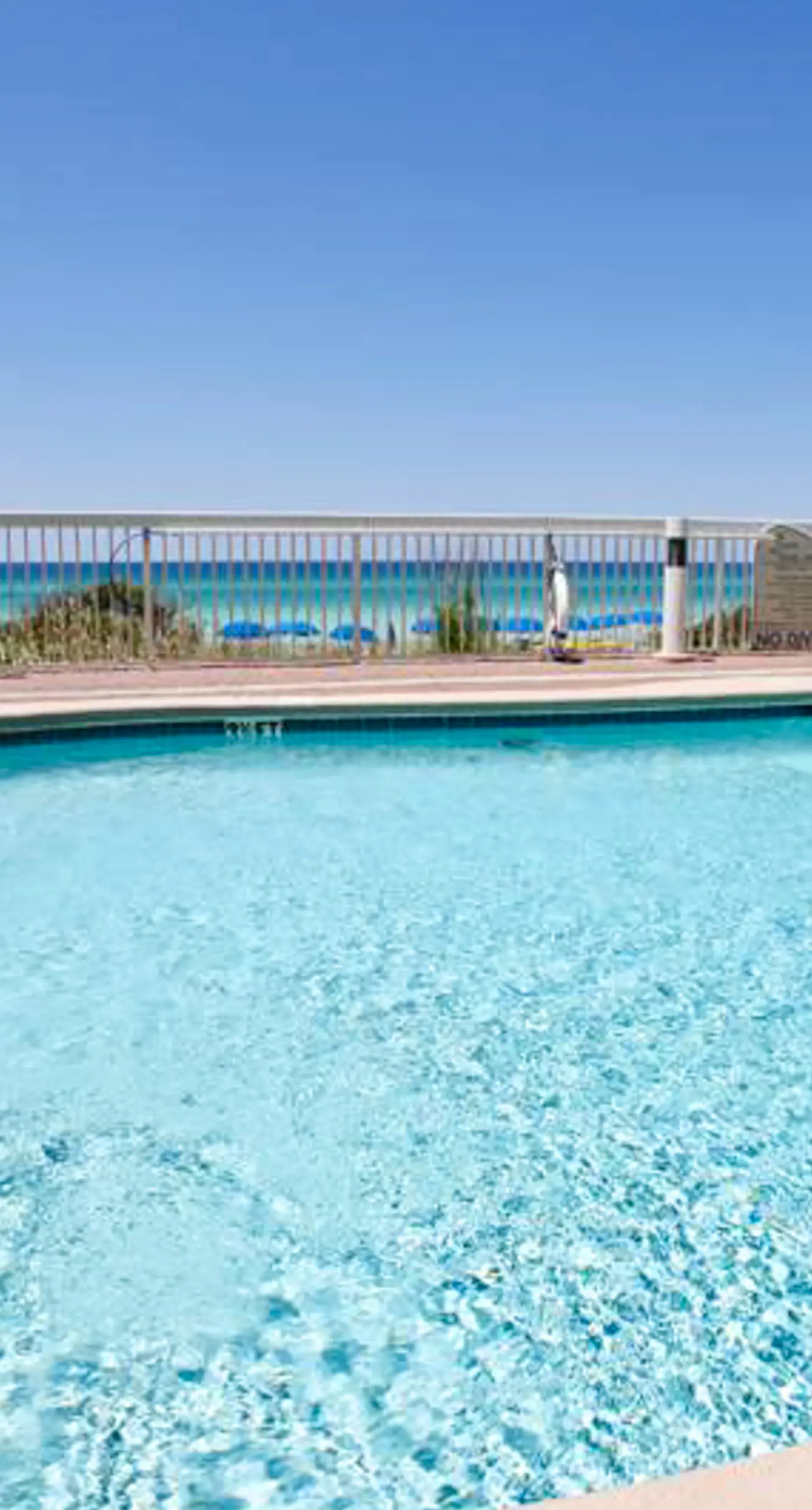 Unique beach condo in Panama City with Gulf views, pools & fitness facility