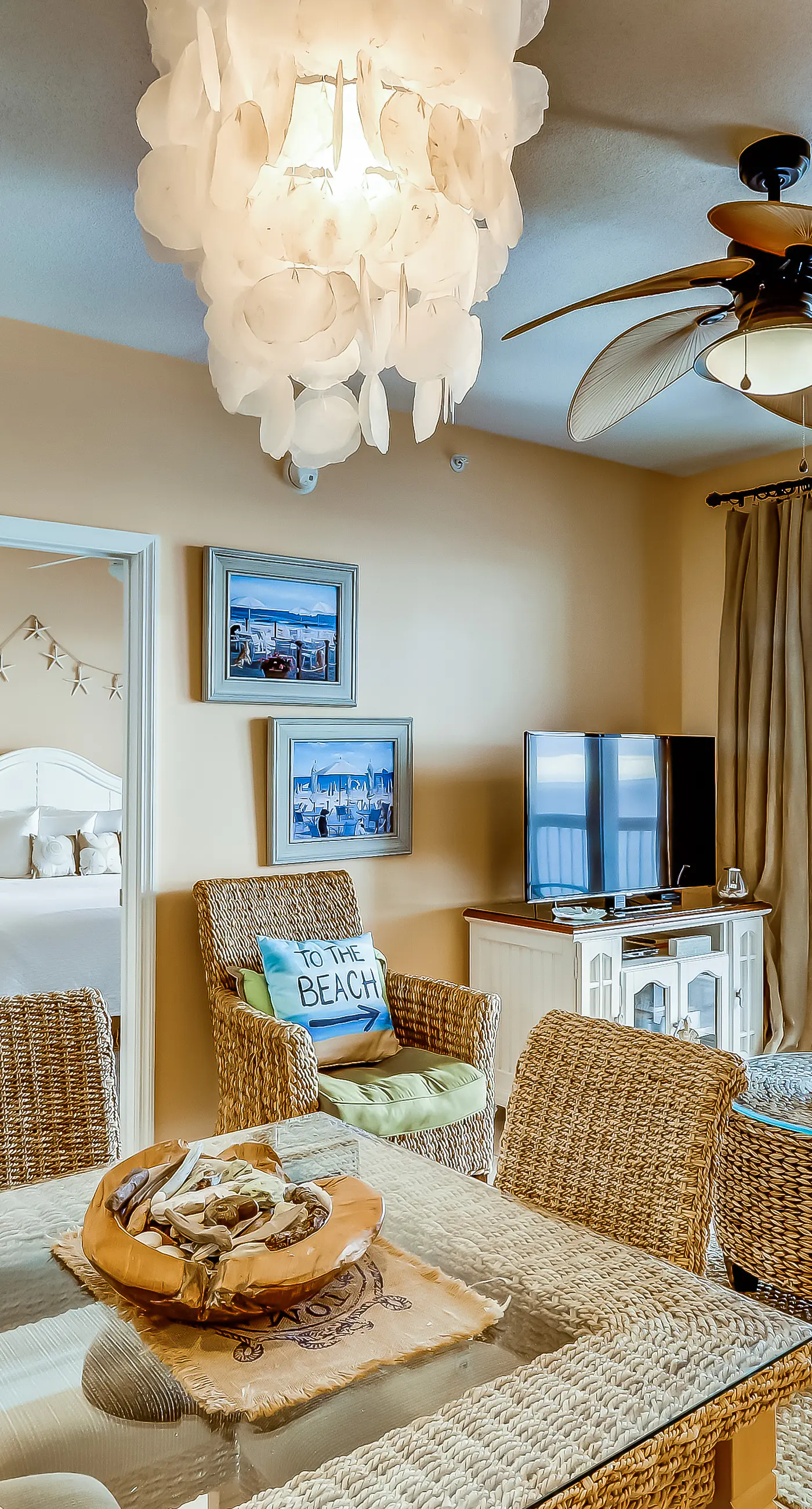Serene & upscale beachfront condo with furnished balcony, view, & pools