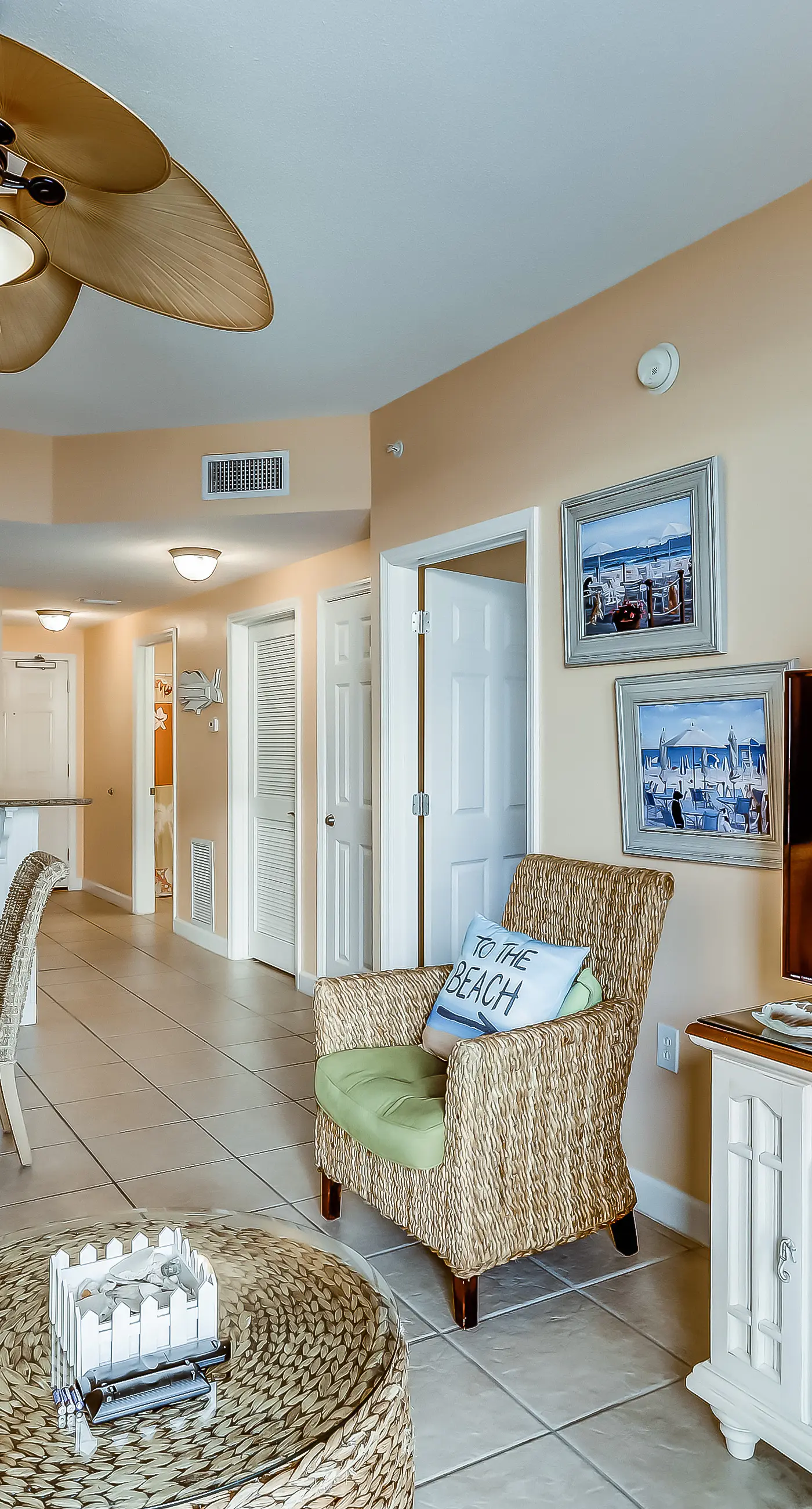 Serene & upscale beachfront condo with furnished balcony, view, & pools
