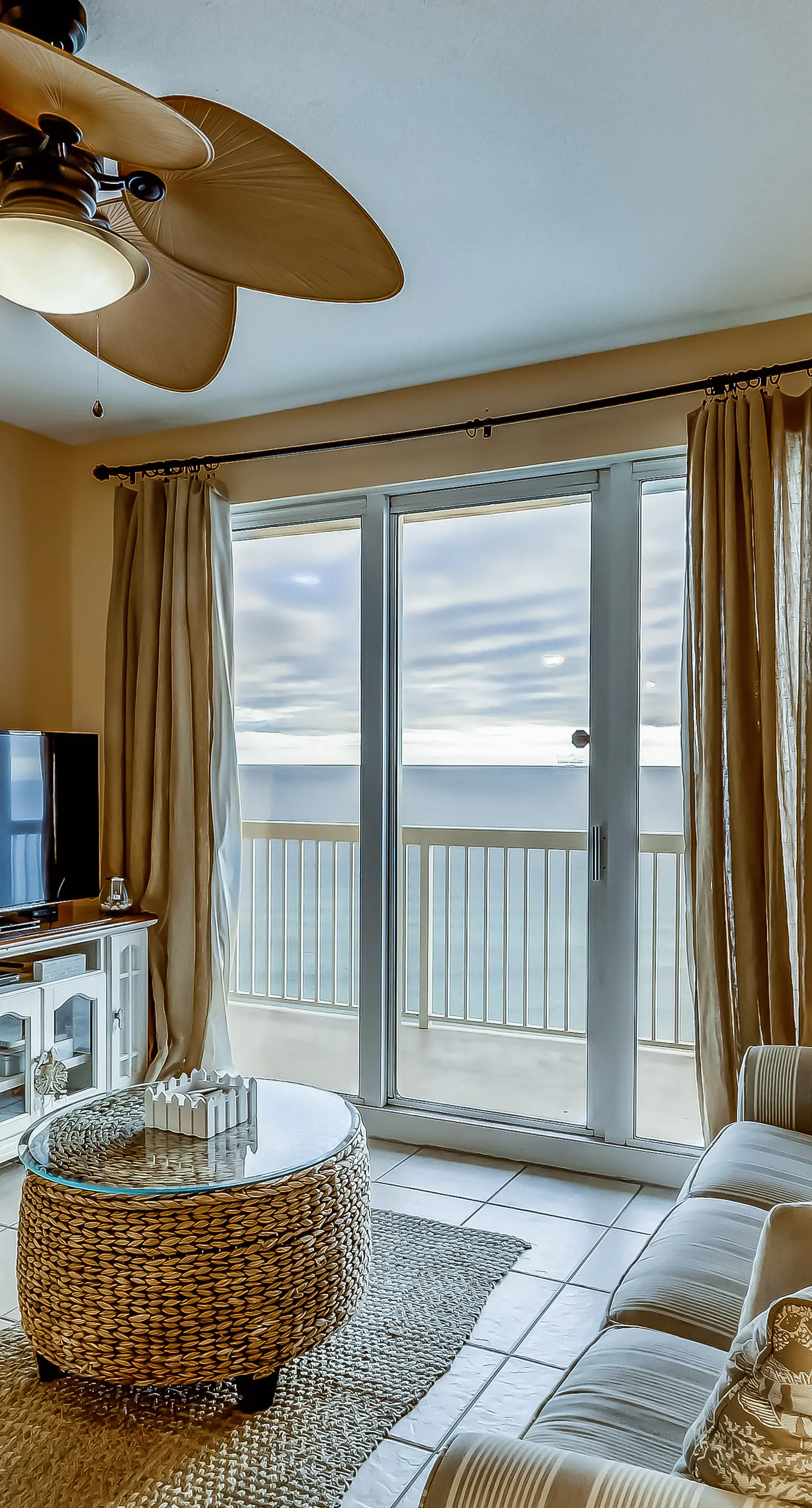 Serene & upscale beachfront condo with furnished balcony, view, & pools