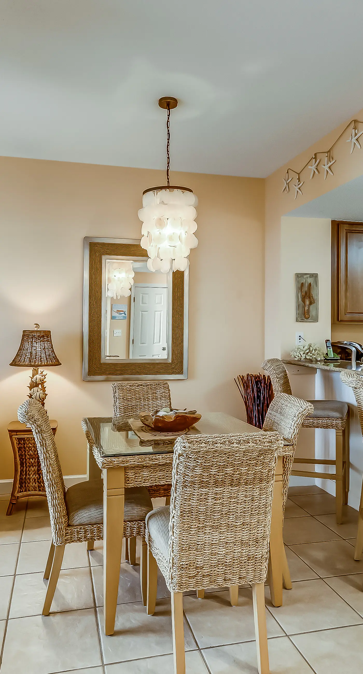 Serene & upscale beachfront condo with furnished balcony, view, & pools