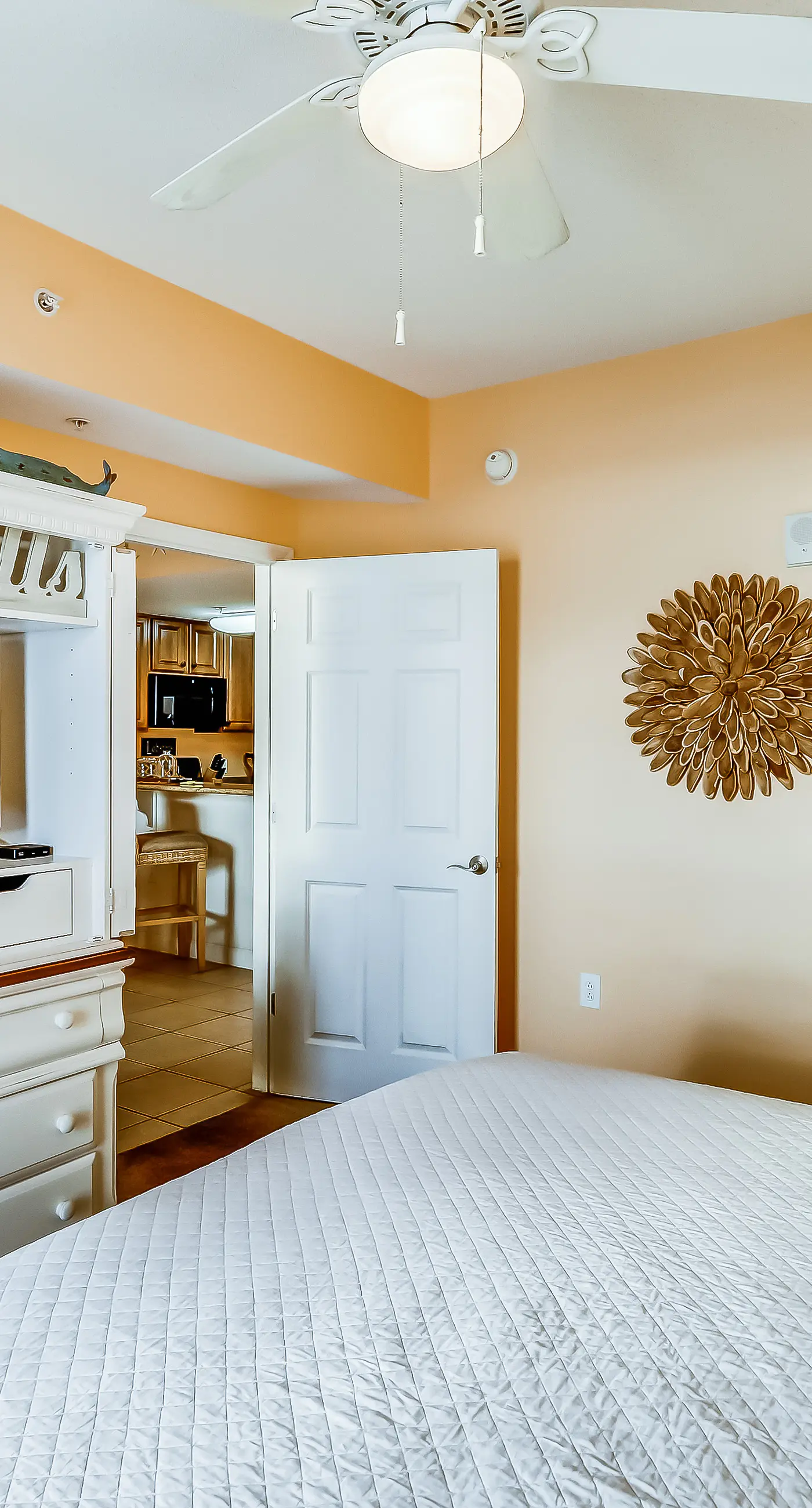Serene & upscale beachfront condo with furnished balcony, view, & pools