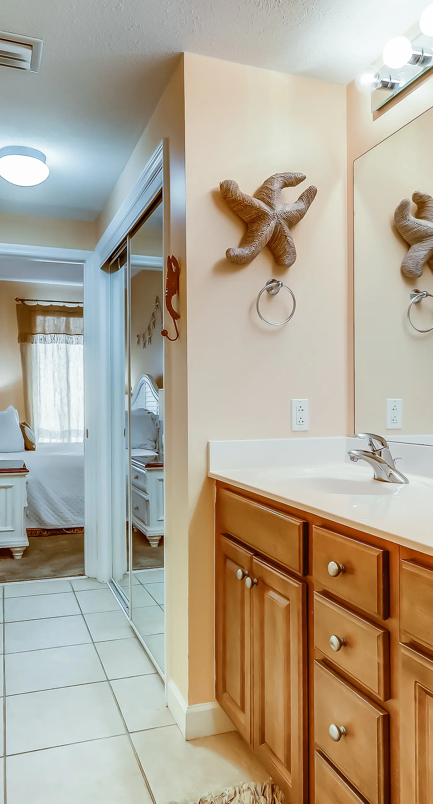 Serene & upscale beachfront condo with furnished balcony, view, & pools