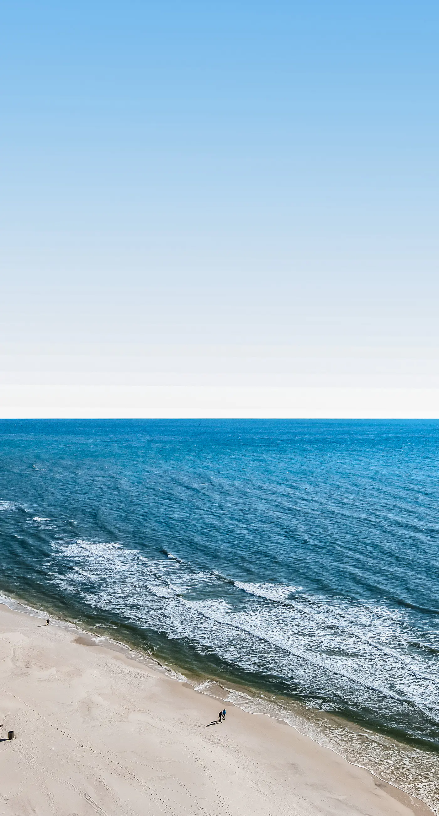 Tropical, waterfront oasis with furnished balcony, pools, & beach access