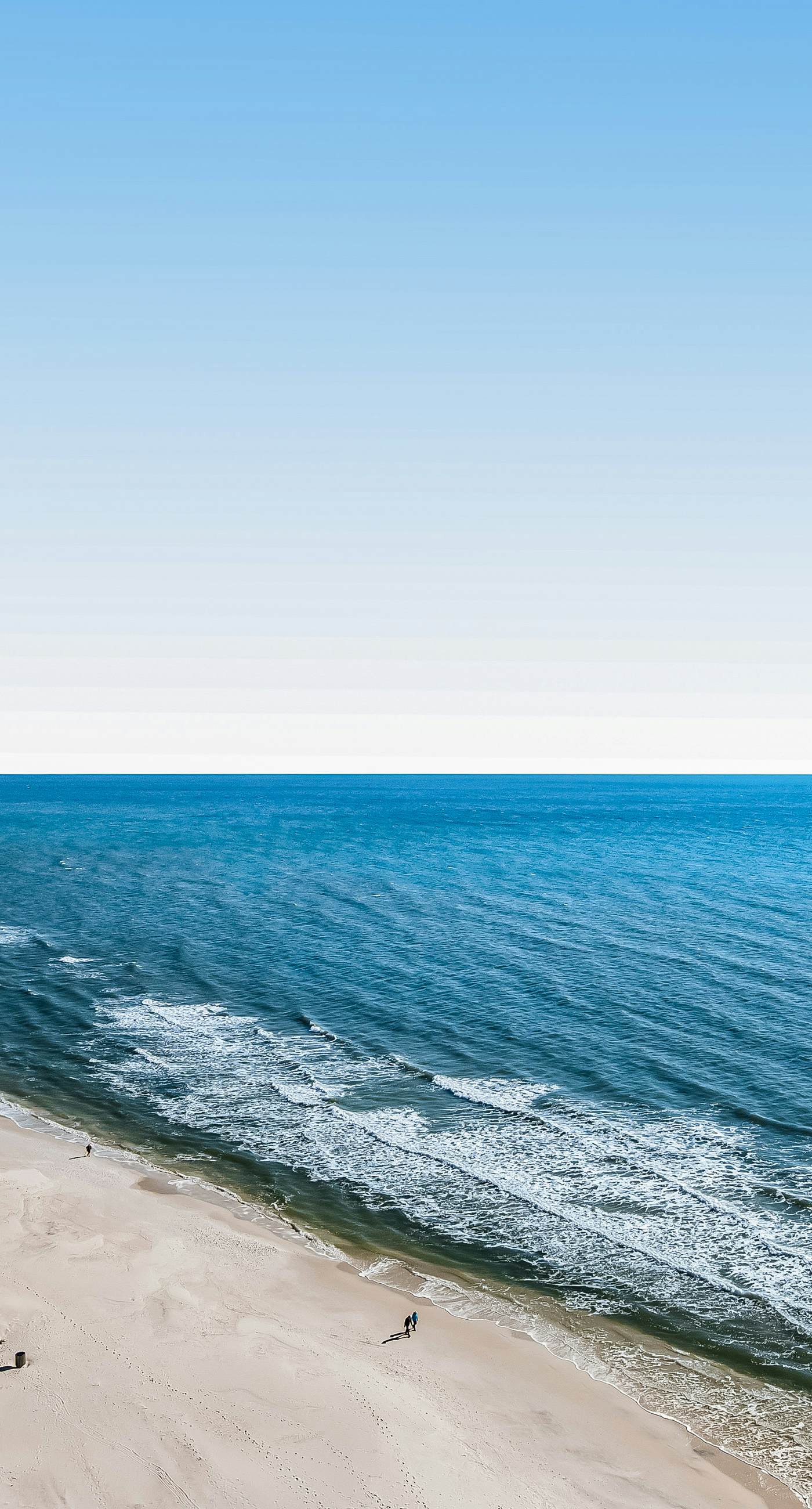 Tropical, waterfront oasis with furnished balcony, pools, & beach access