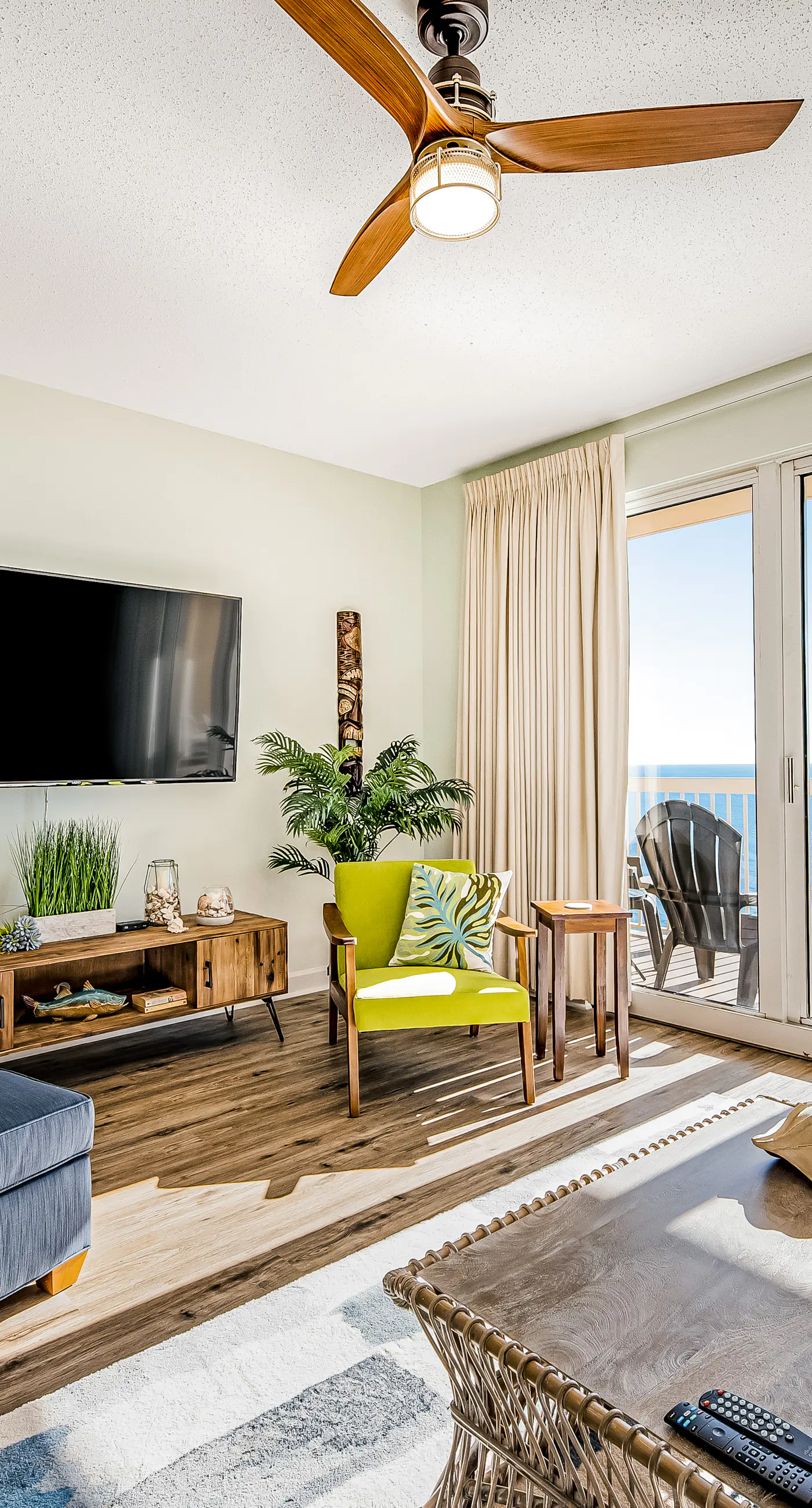 Tropical, waterfront oasis with furnished balcony, pools, & beach access