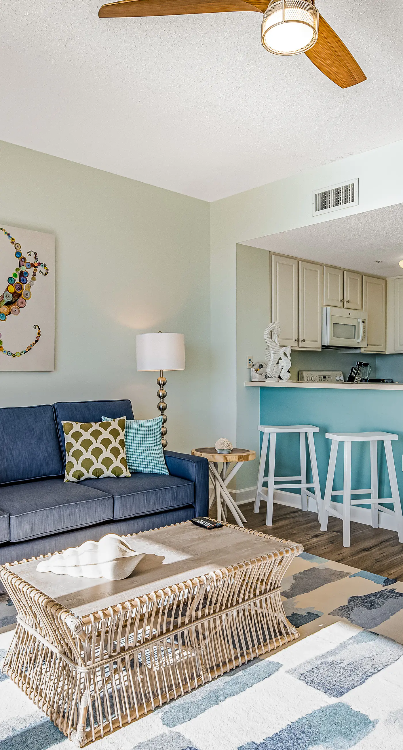 Tropical, waterfront oasis with furnished balcony, pools, & beach access