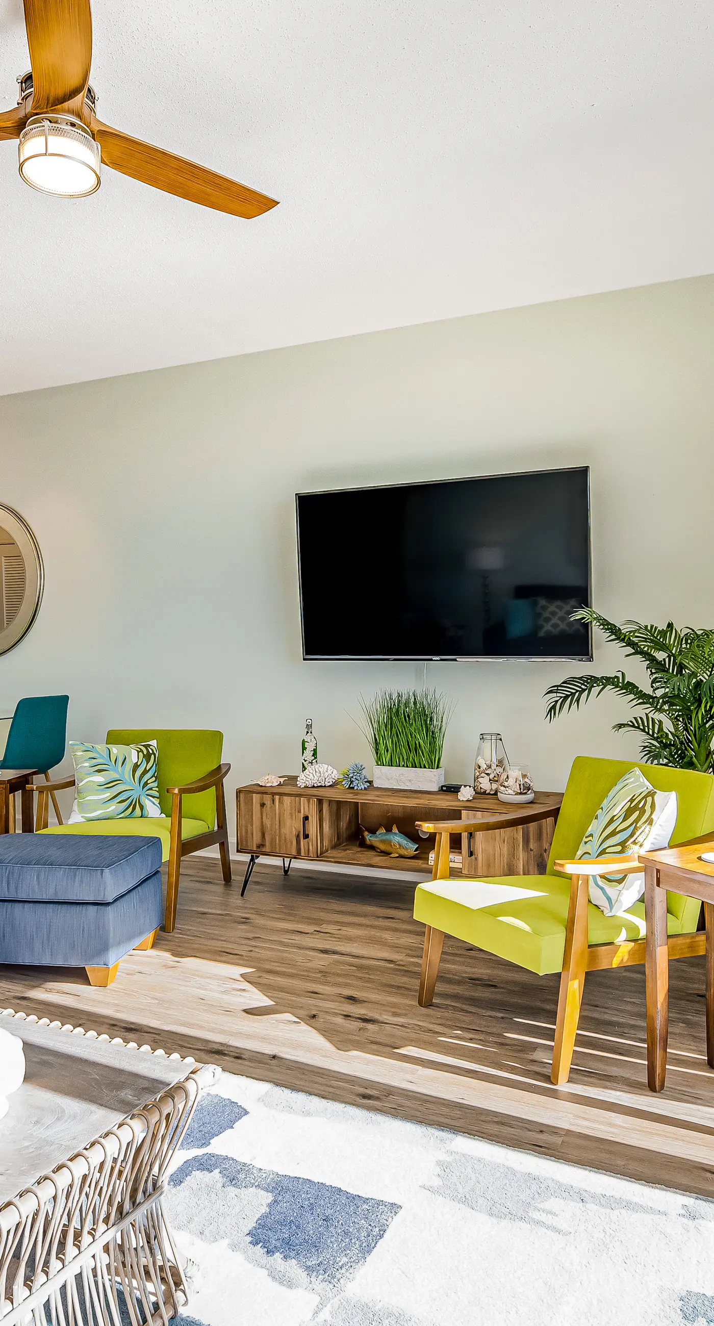 Tropical, waterfront oasis with furnished balcony, pools, & beach access