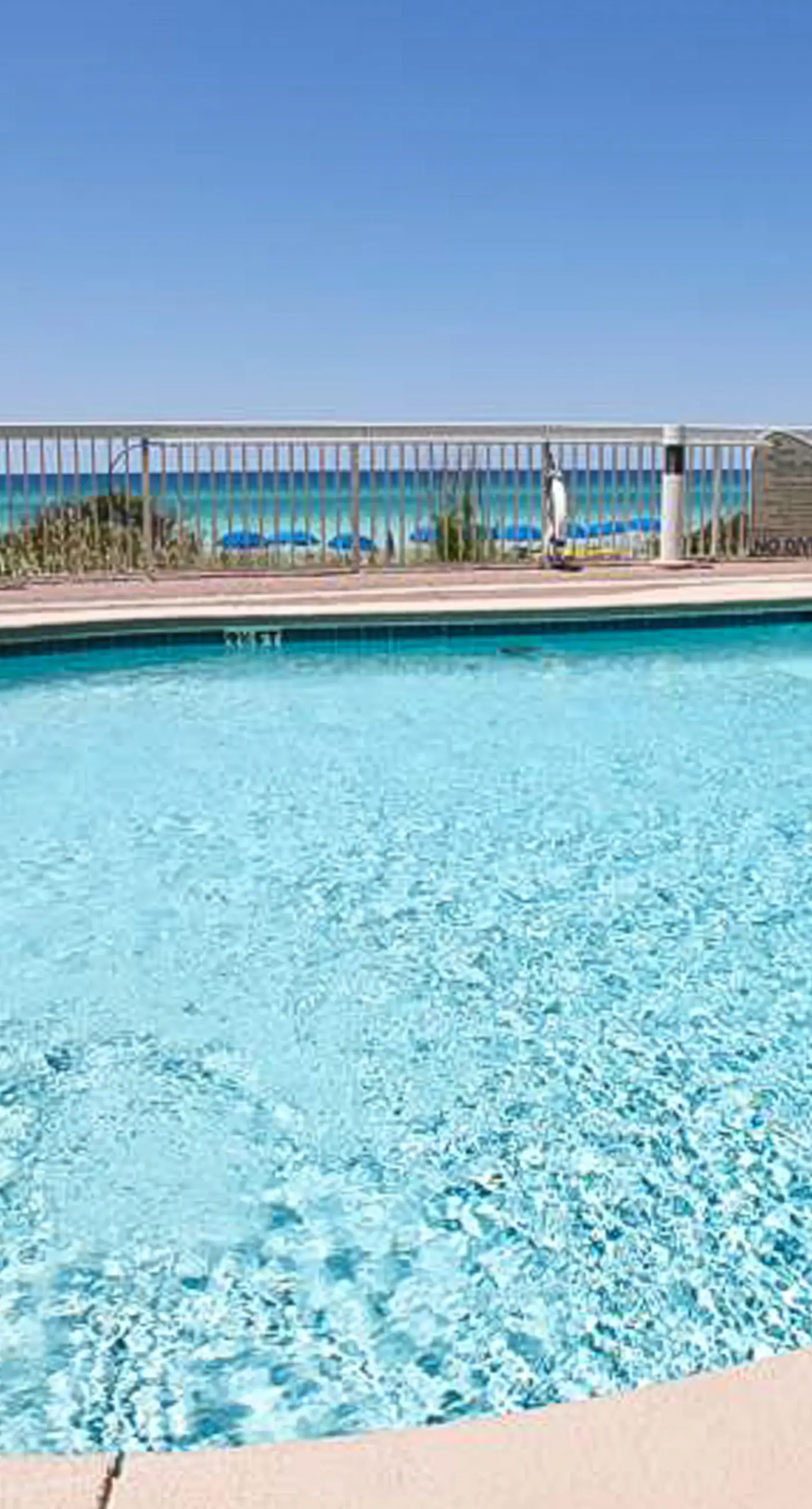 Sunny, eighth-floor, beachfront condo with pools, hot tub, & fitness room