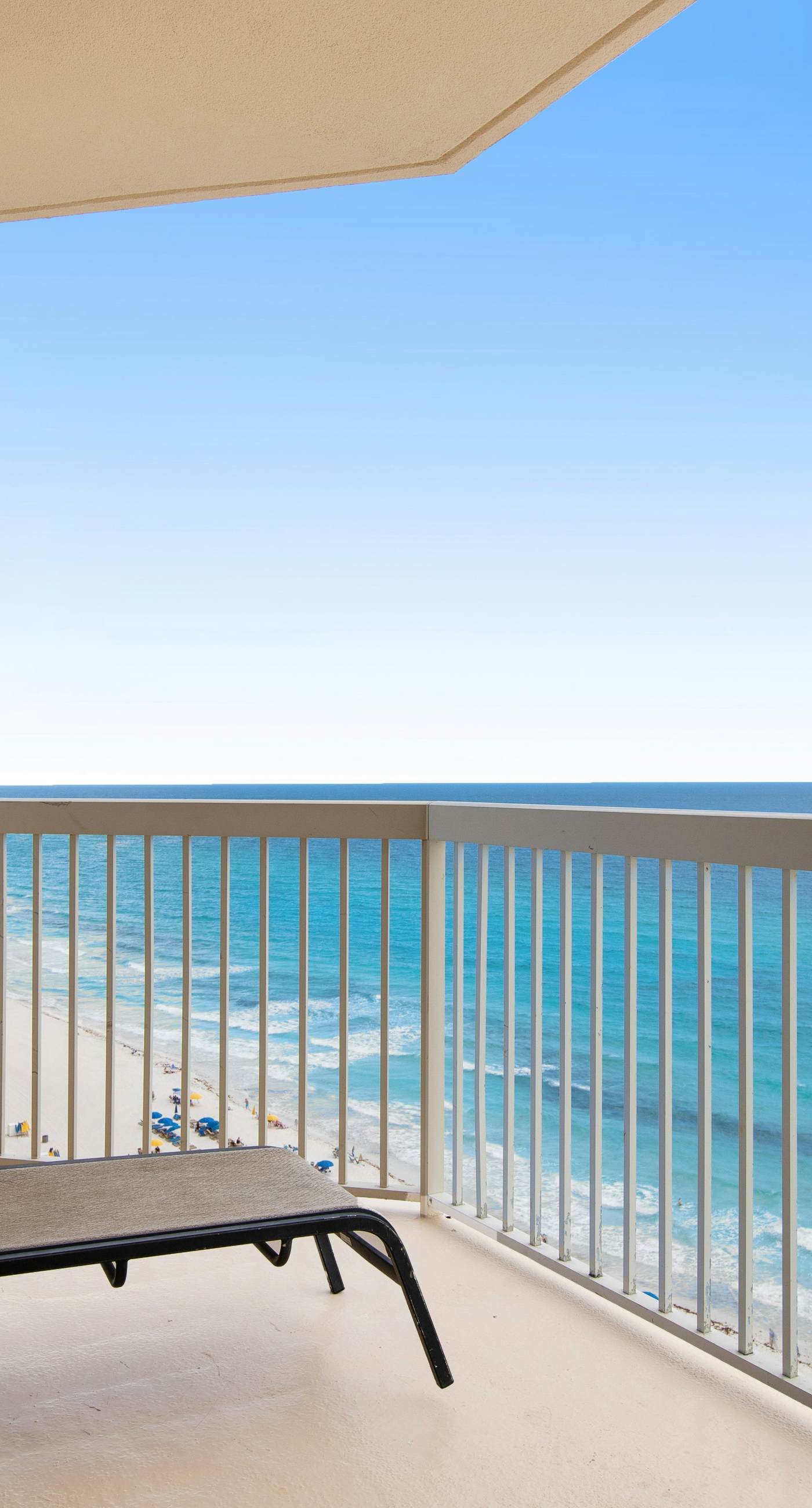 High-rise, beachfront elegance with wraparound balcony, pools, & gym