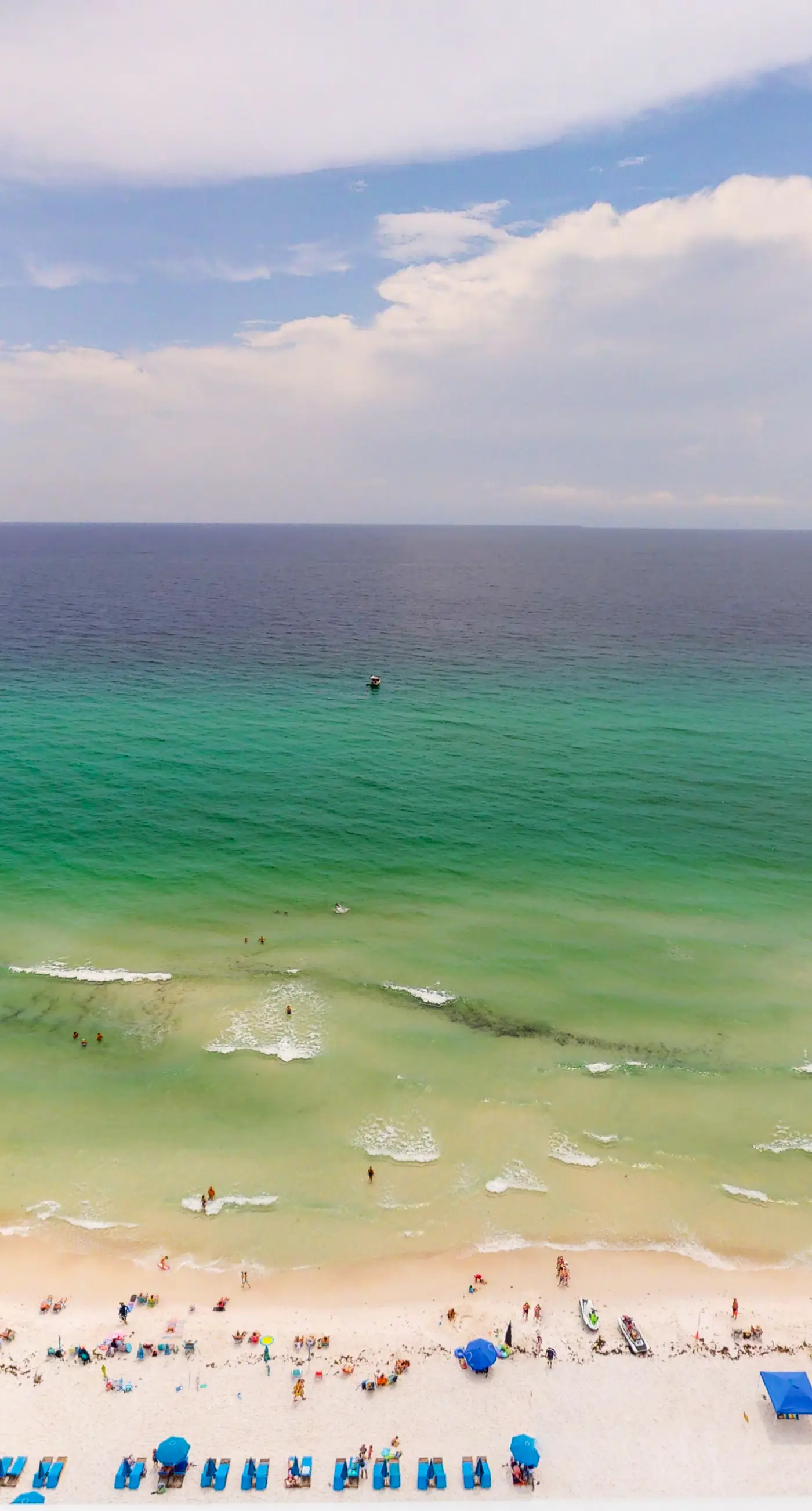 Beachfront, seafoam sanctuary with furnished balcony, pools, & gym