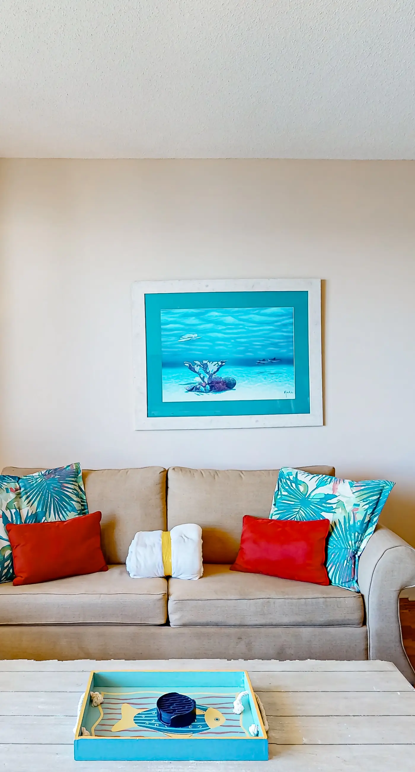 Cozy & colorful beachfront condo with balcony, pools, & fitness center