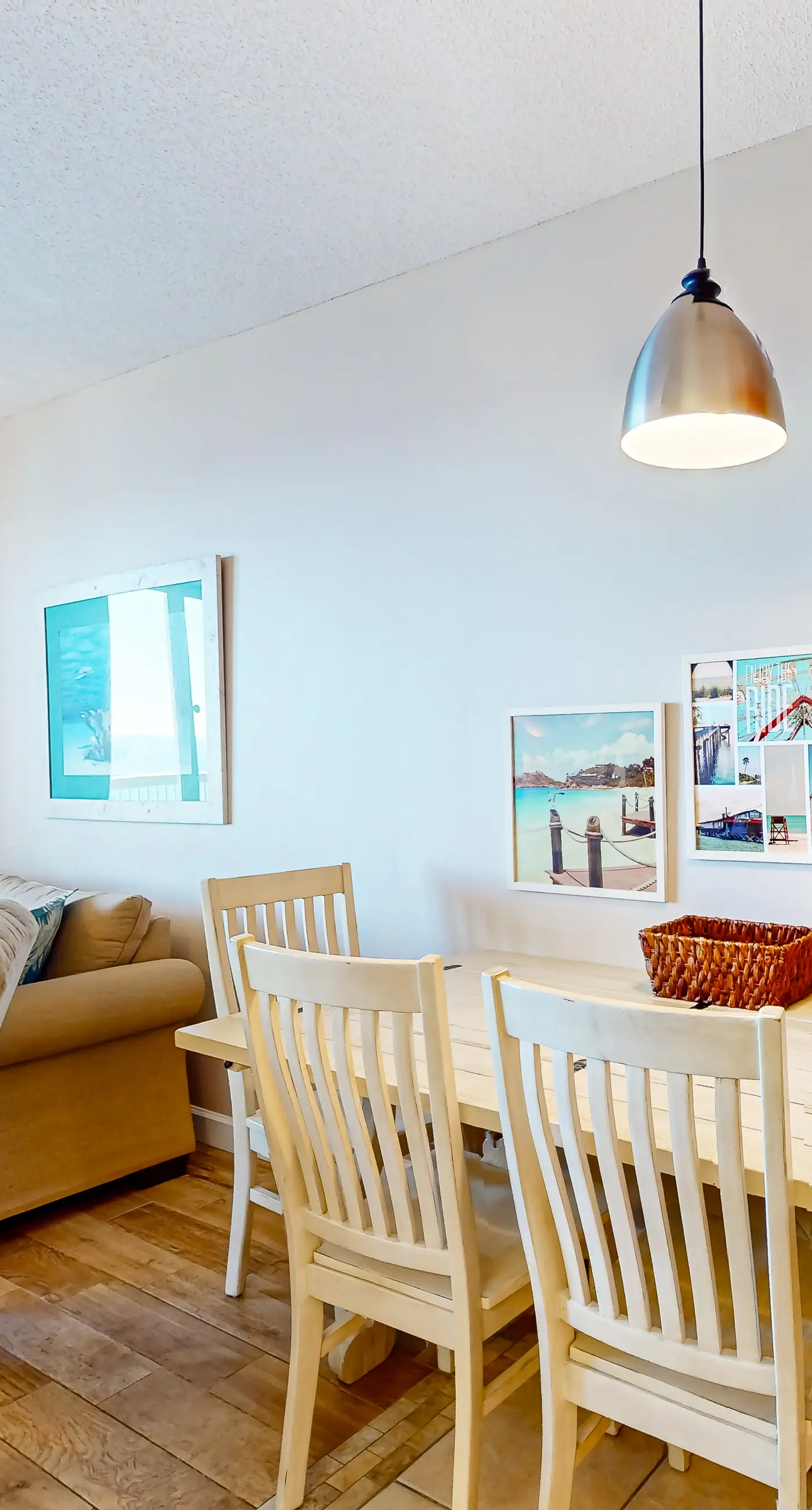 Cozy & colorful beachfront condo with balcony, pools, & fitness center