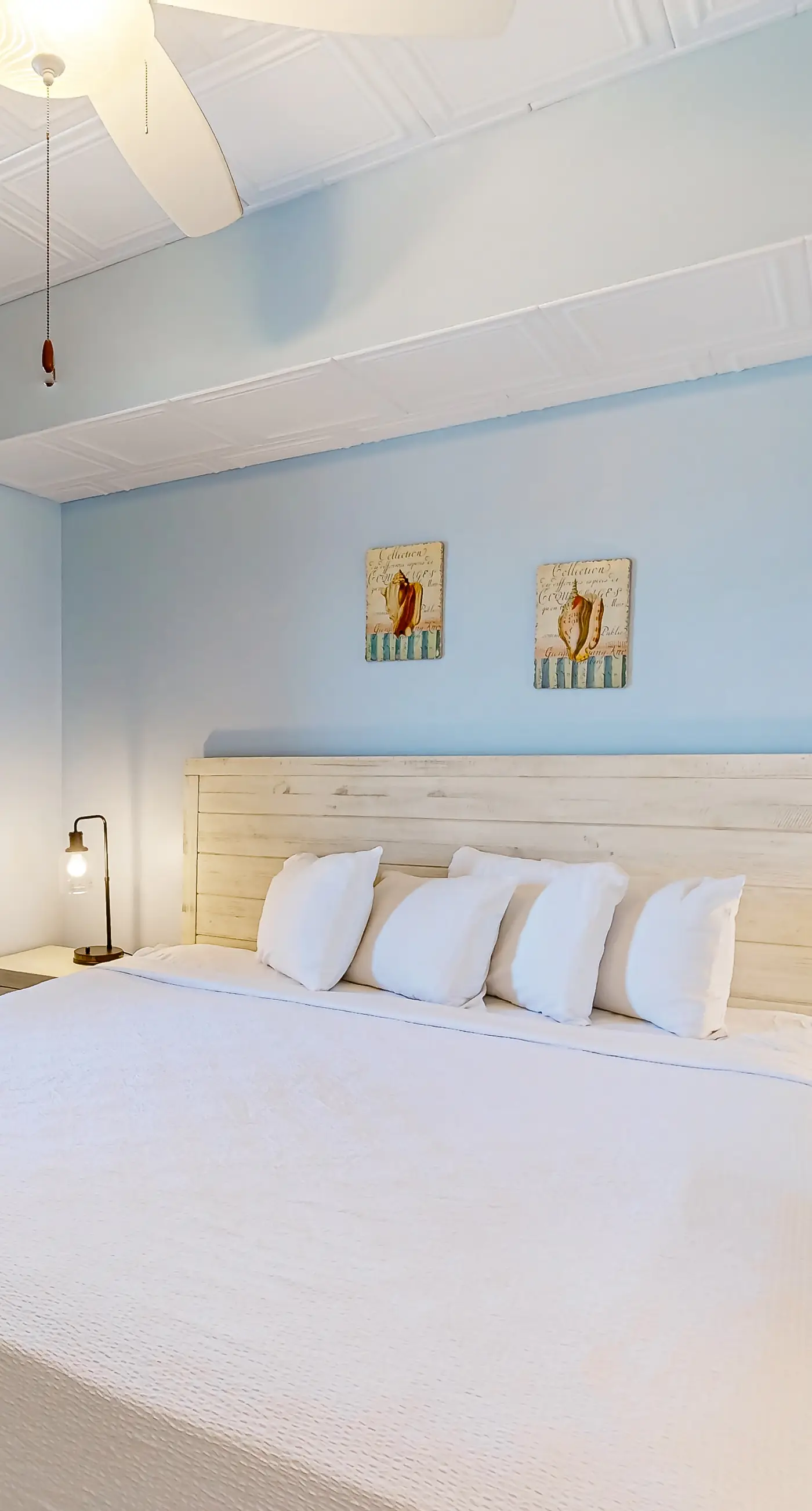 Cozy & colorful beachfront condo with balcony, pools, & fitness center