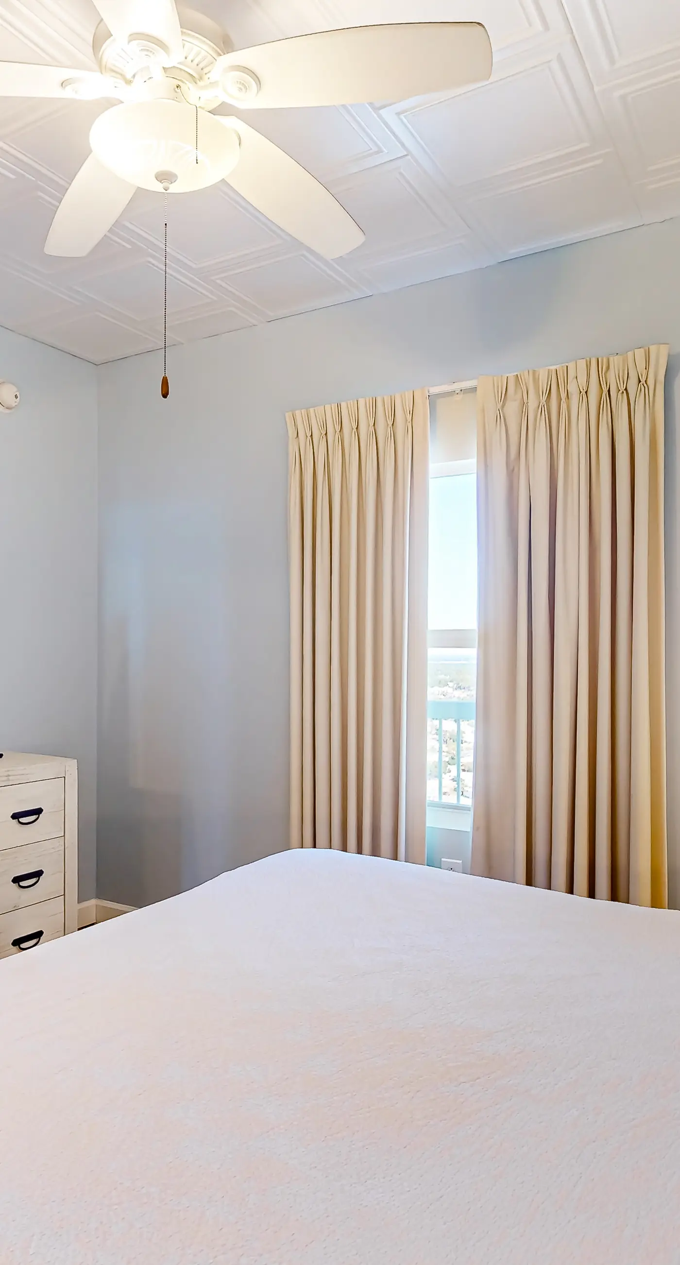 Cozy & colorful beachfront condo with balcony, pools, & fitness center