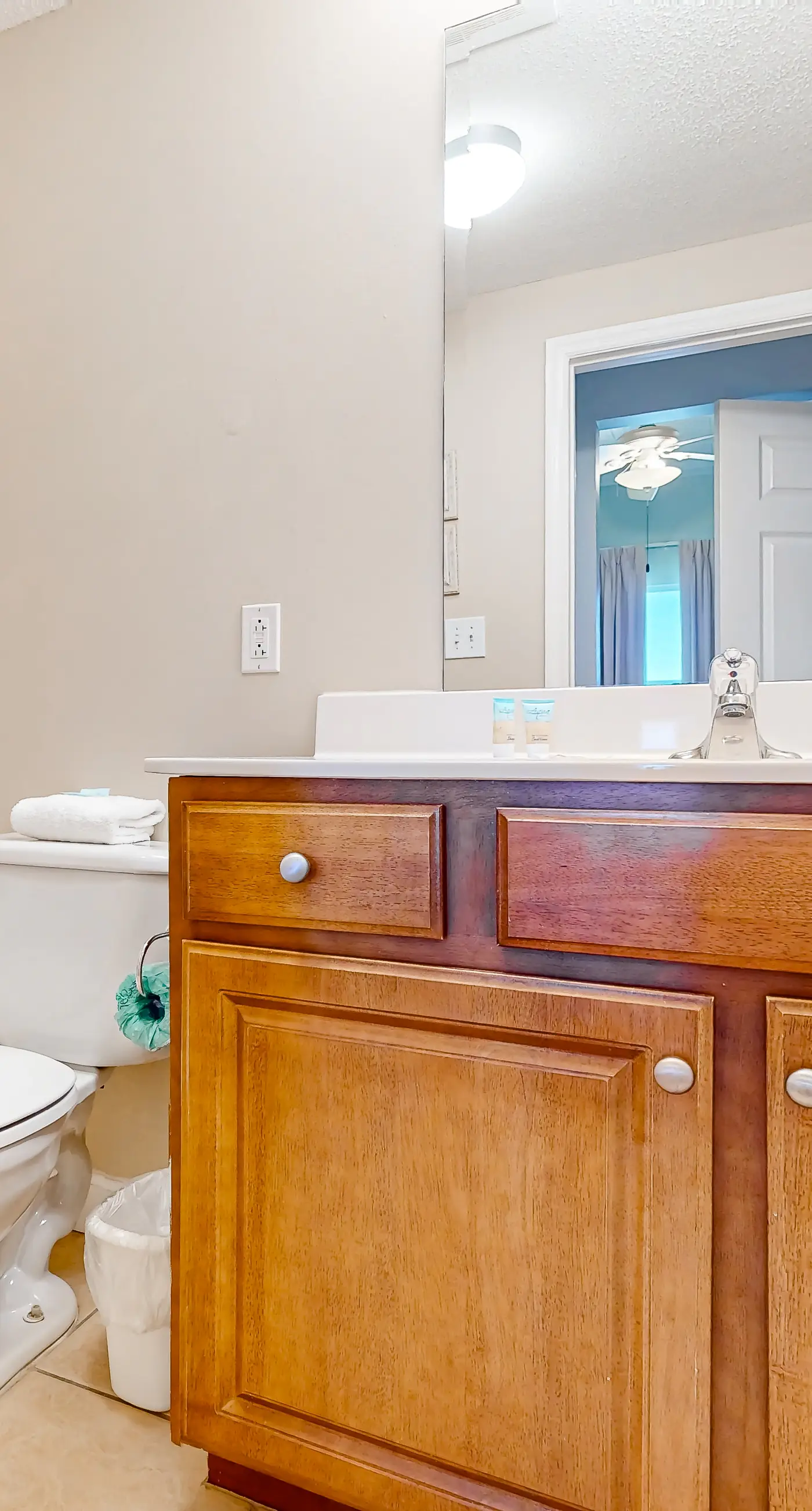 Cozy & colorful beachfront condo with balcony, pools, & fitness center