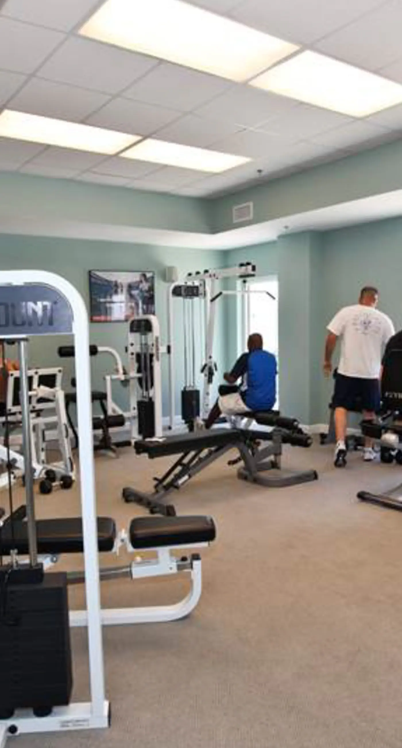 Cozy & colorful beachfront condo with balcony, pools, & fitness center