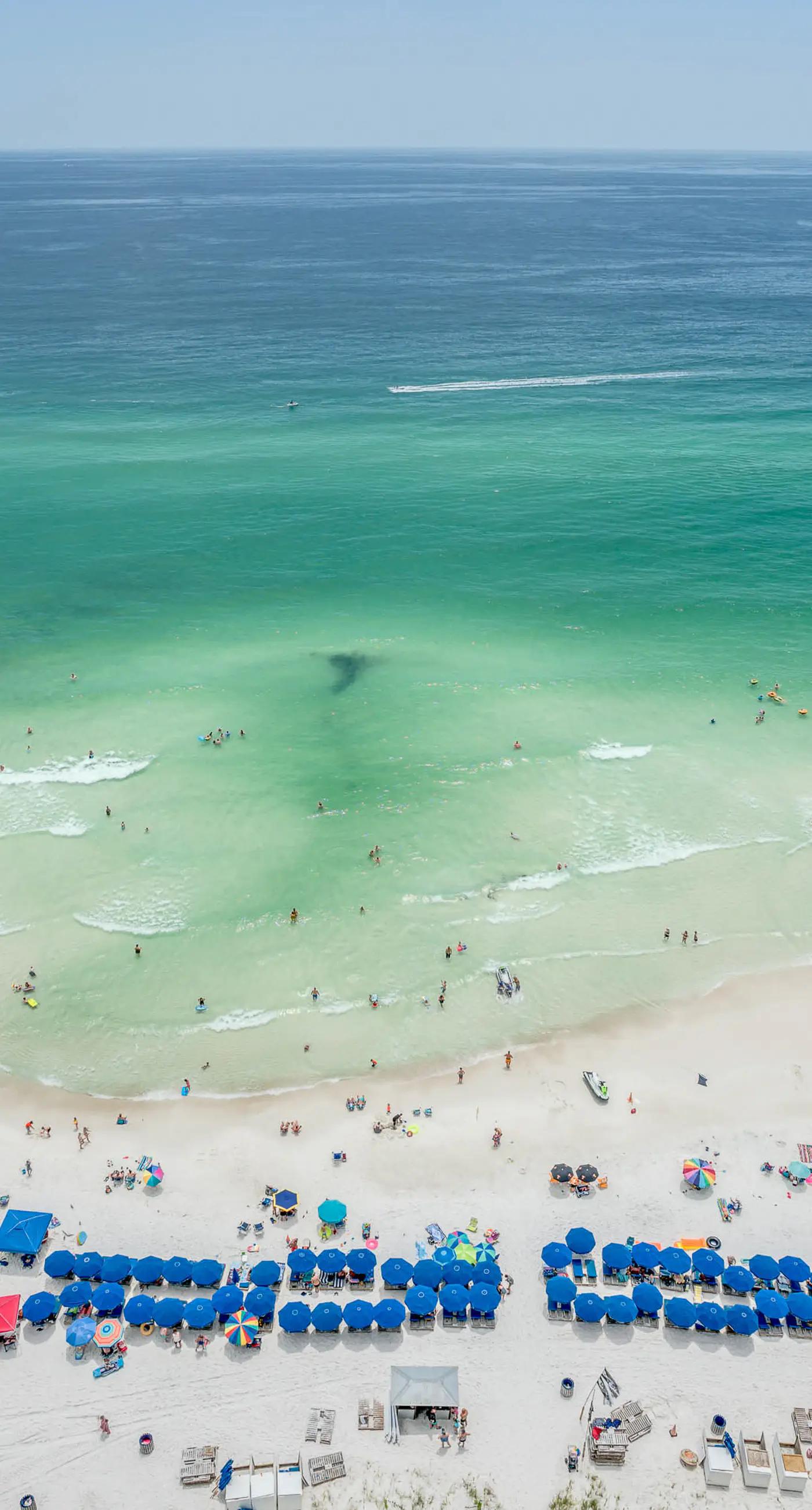 Cozy & colorful beachfront condo with balcony, pools, & fitness center