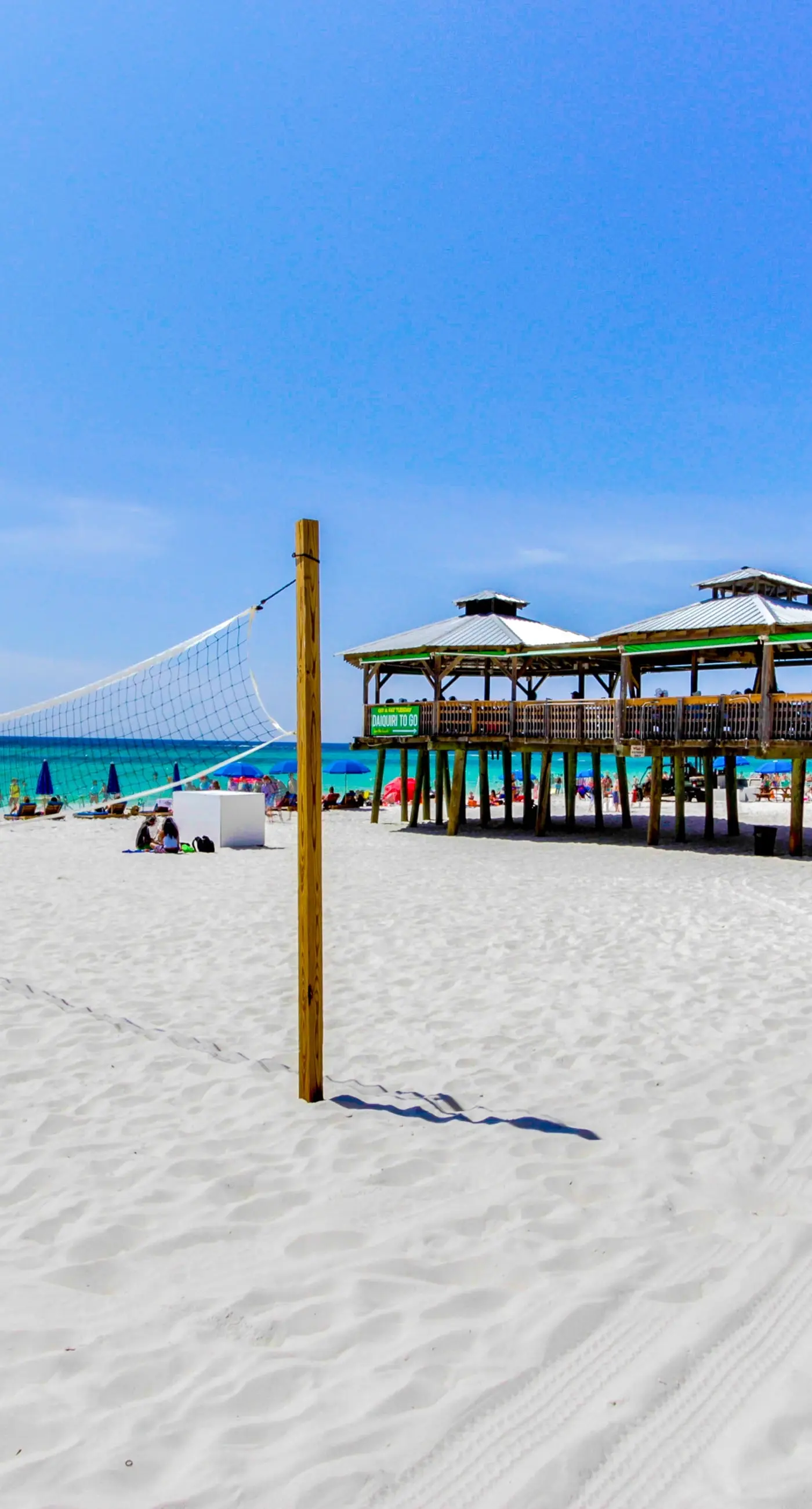 Cozy & colorful beachfront condo with balcony, pools, & fitness center