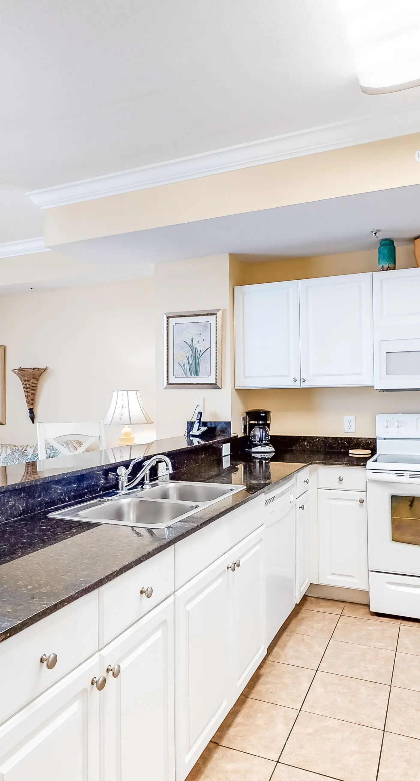 Charming, waterfront condo with pools, fitness center & beach access