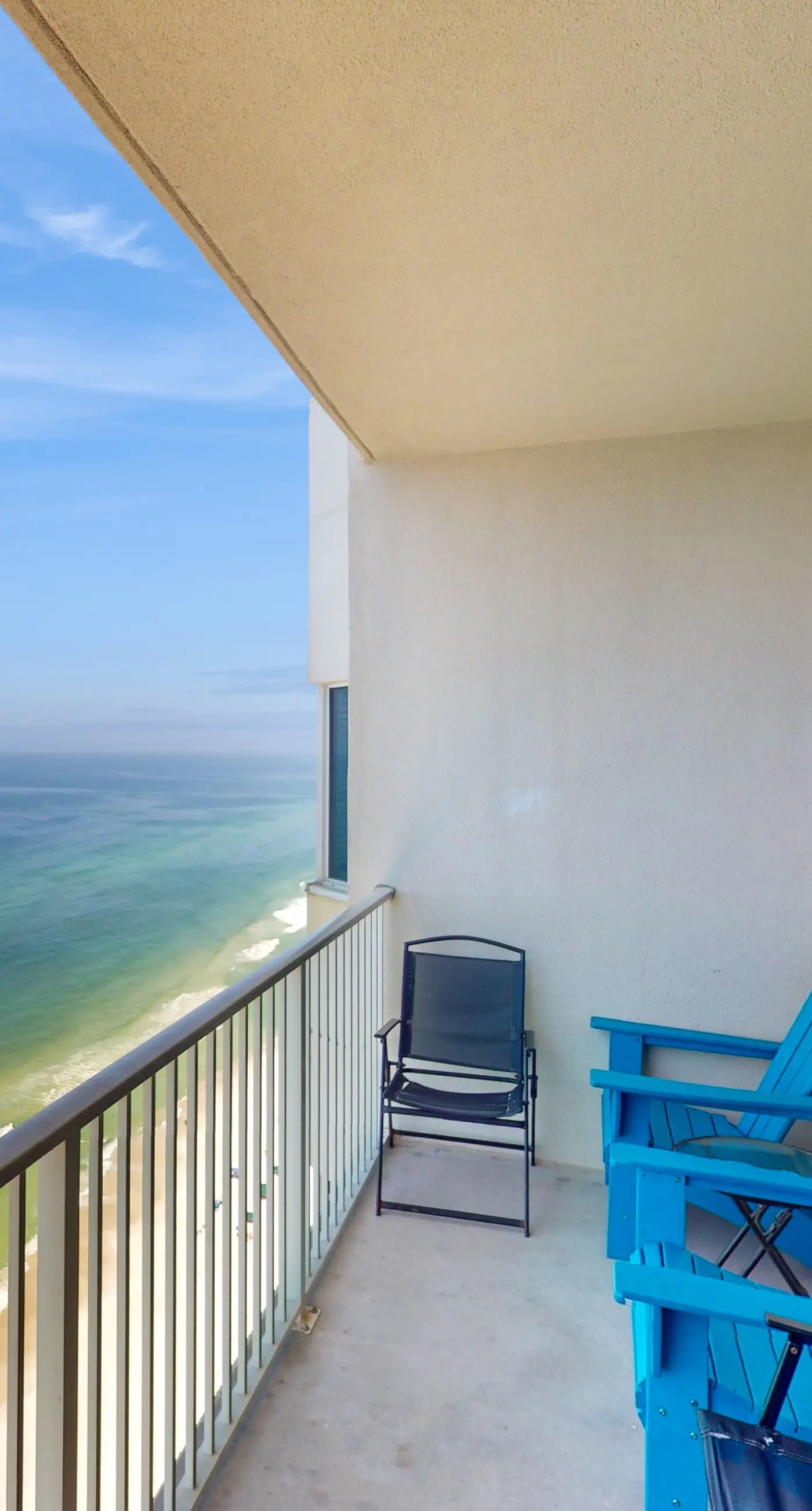 Beachfront Condo with Ocean View Balcony, Shared Pool, Central AC, & WiFi