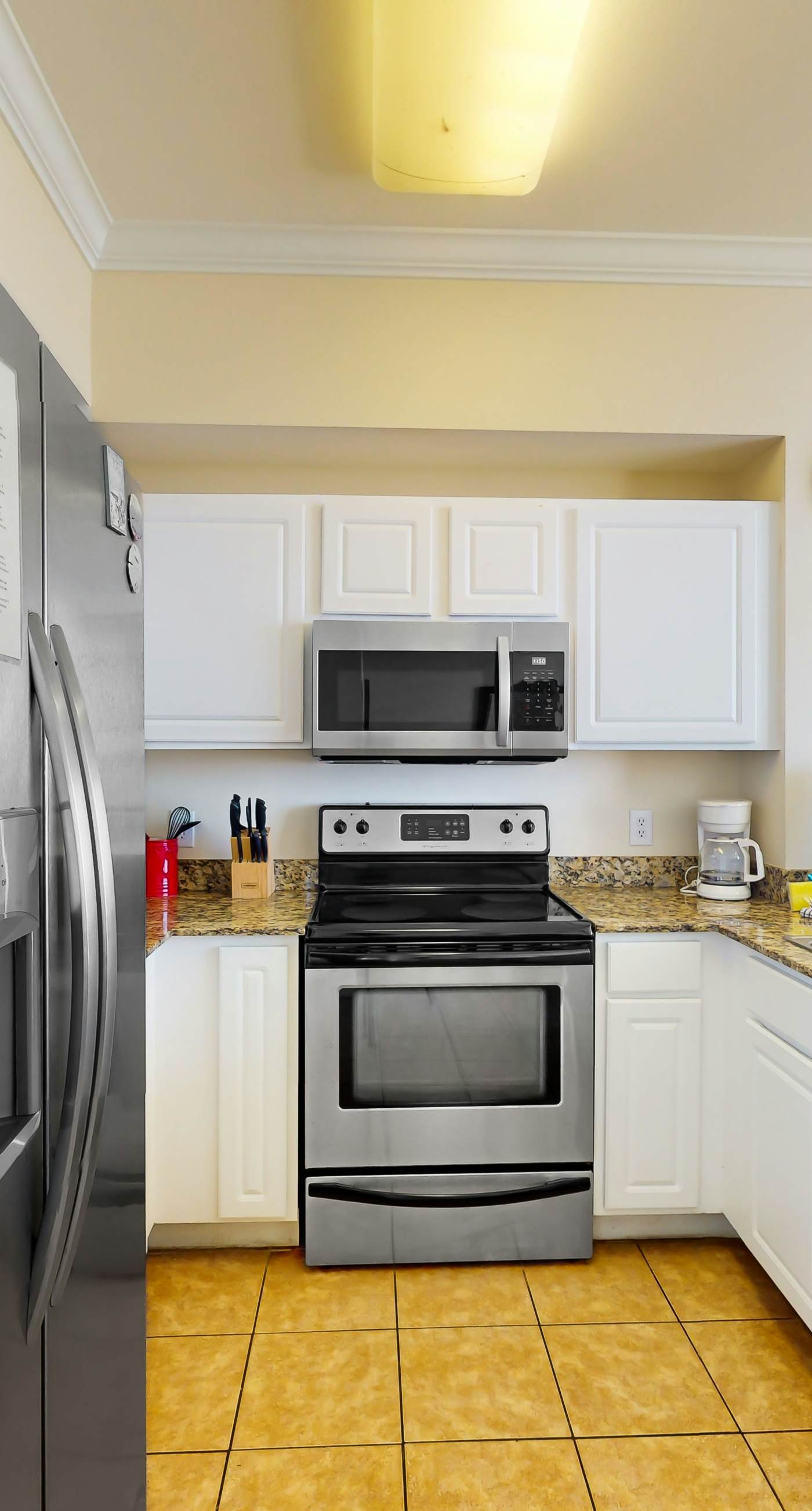 Gulf-front getaway with water views, pools, hot tub, fast WiFi, & central AC