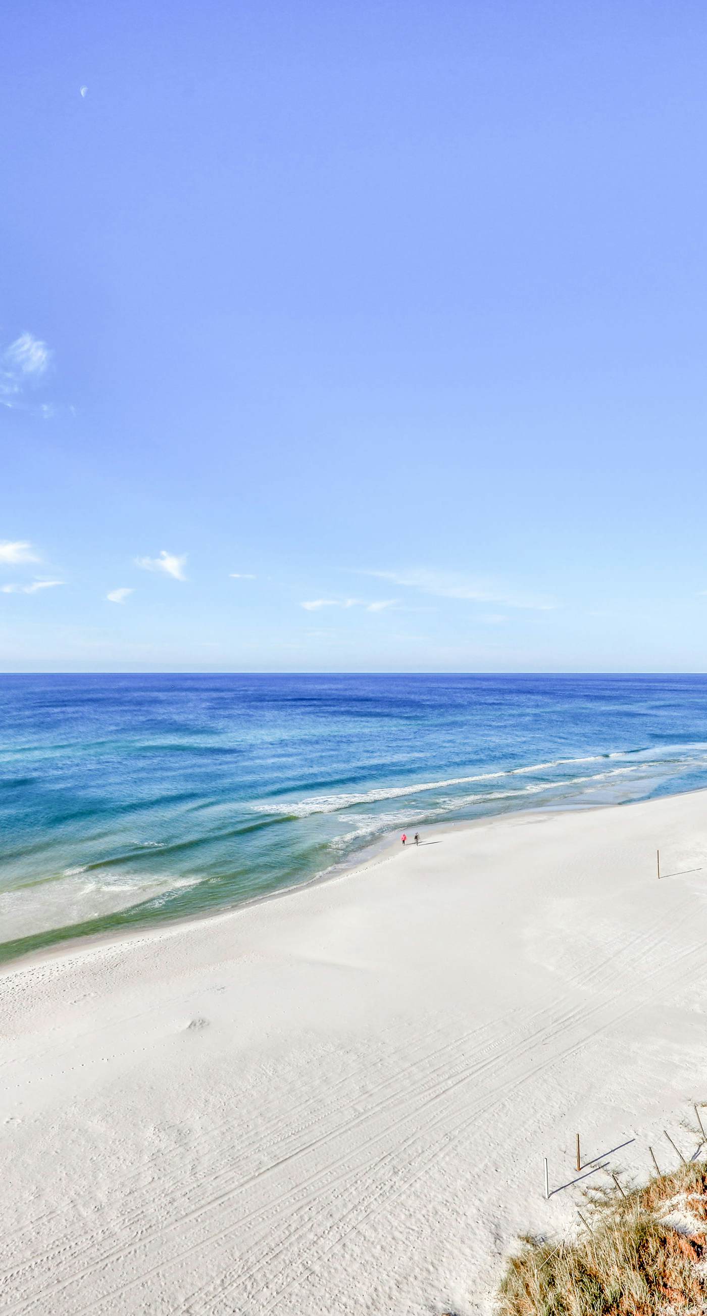 Welcoming, beachfront condo with Gulf views, pools & fitness center