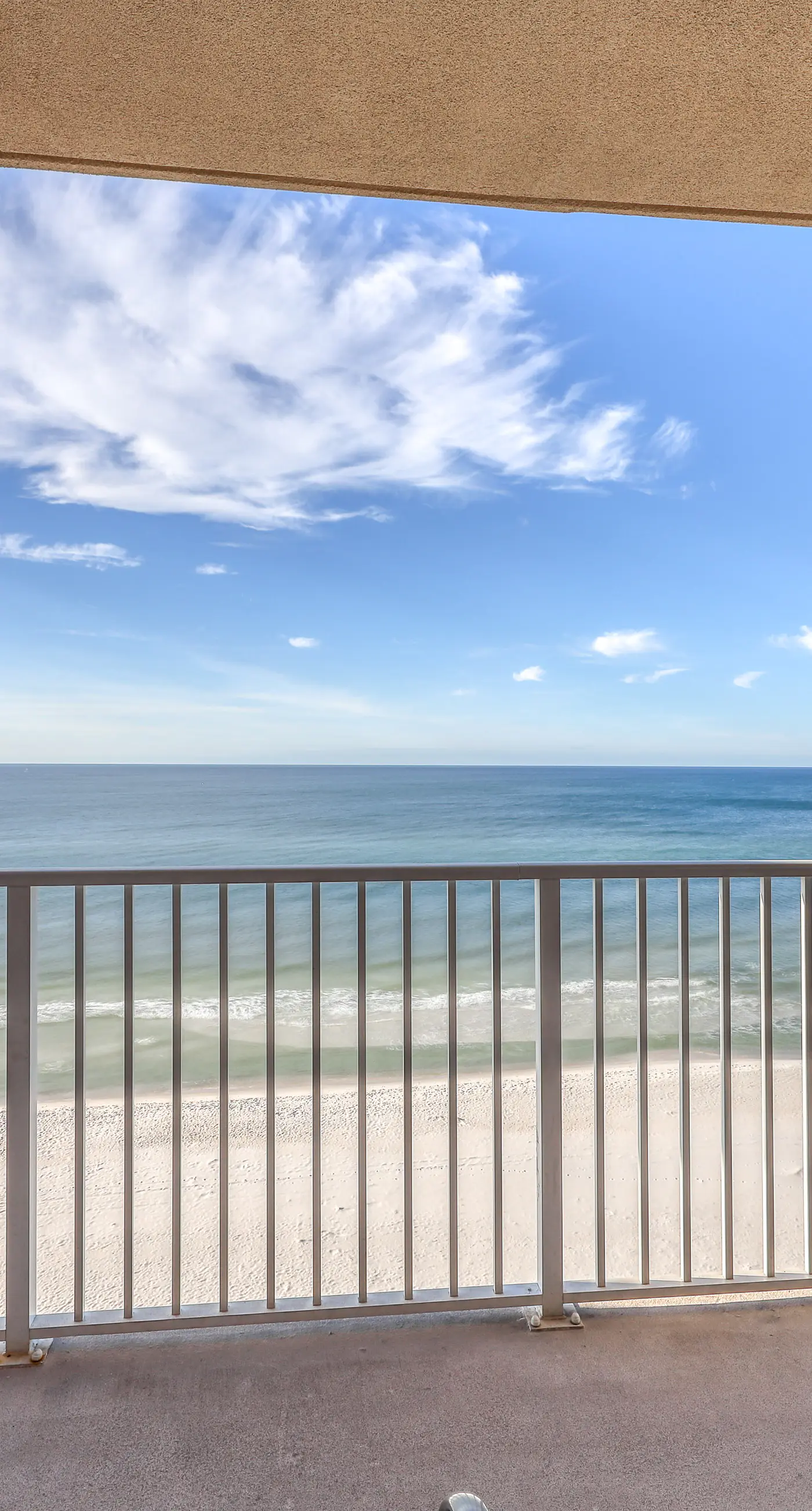 Welcoming, beachfront condo with Gulf views, pools & fitness center