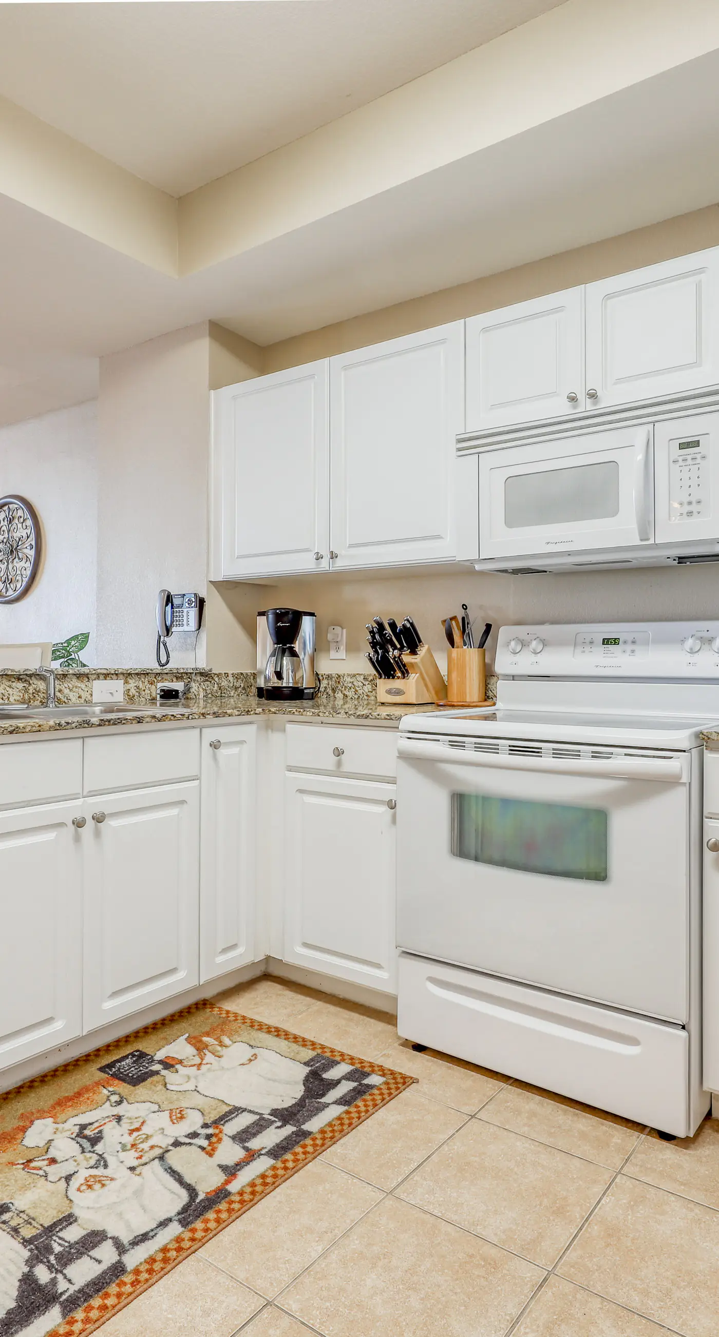 Welcoming, beachfront condo with Gulf views, pools & fitness center