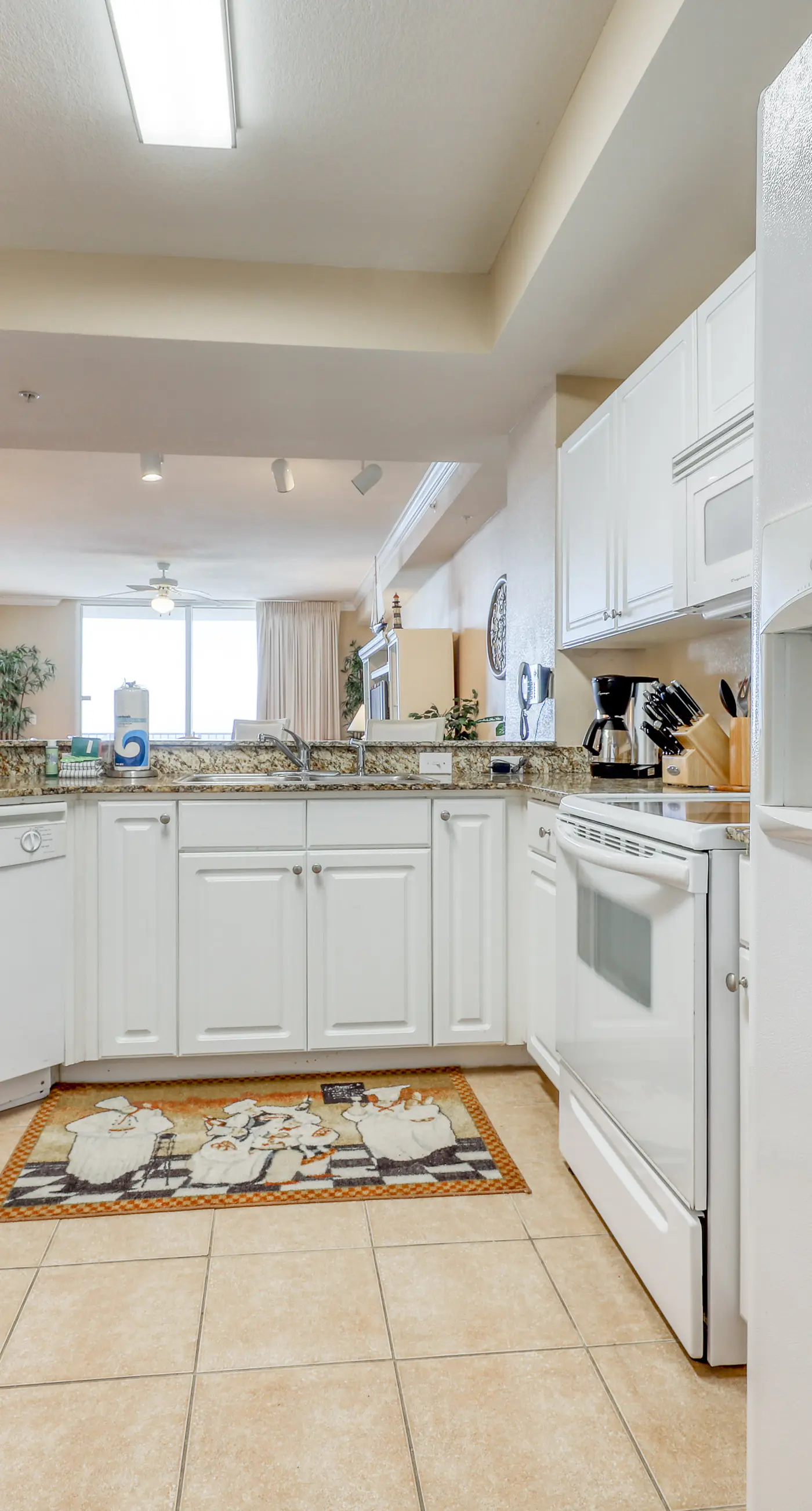 Welcoming, beachfront condo with Gulf views, pools & fitness center
