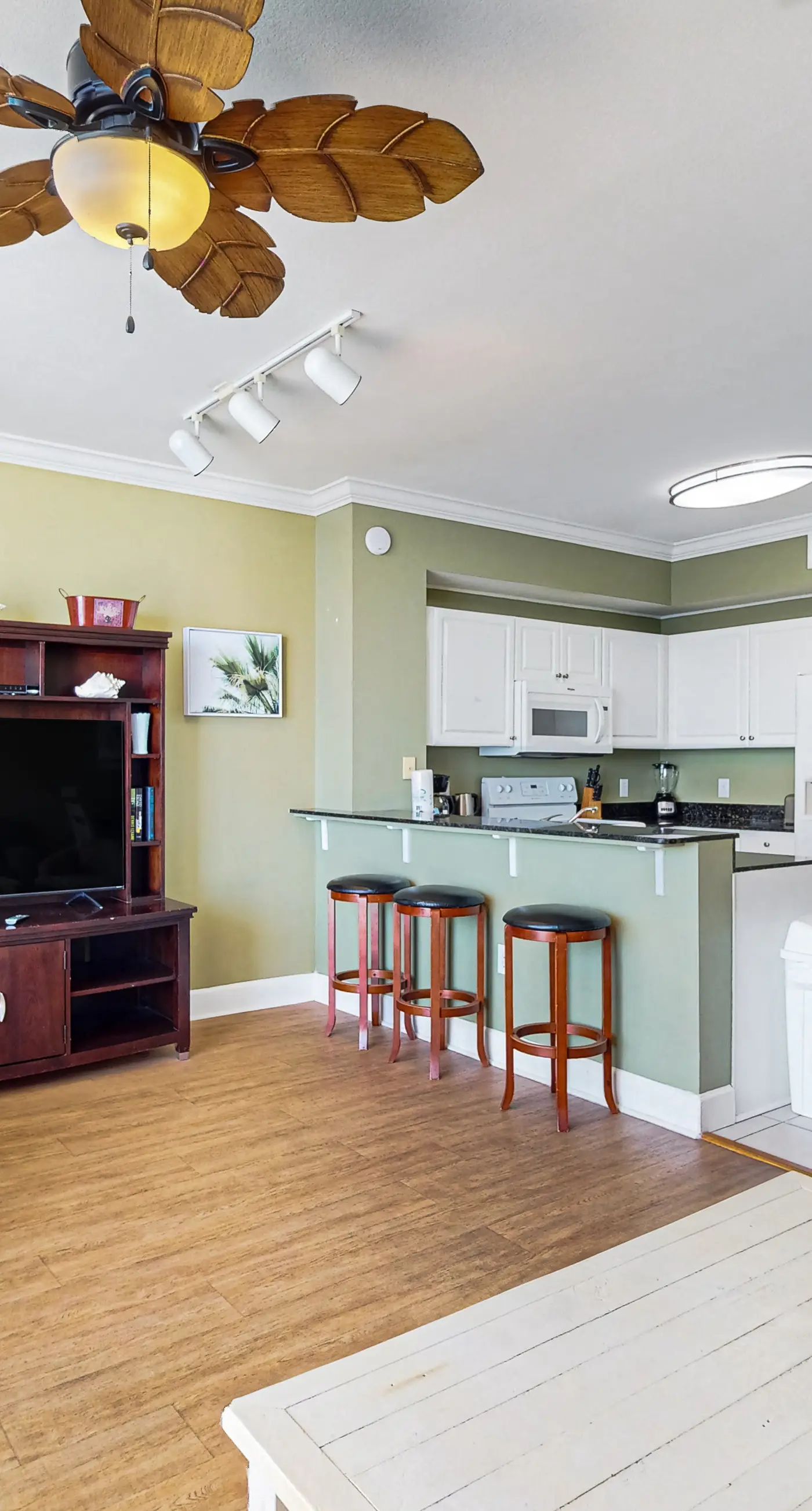 Gulf-front getaway with water views, pools, hot tub, game room & gym