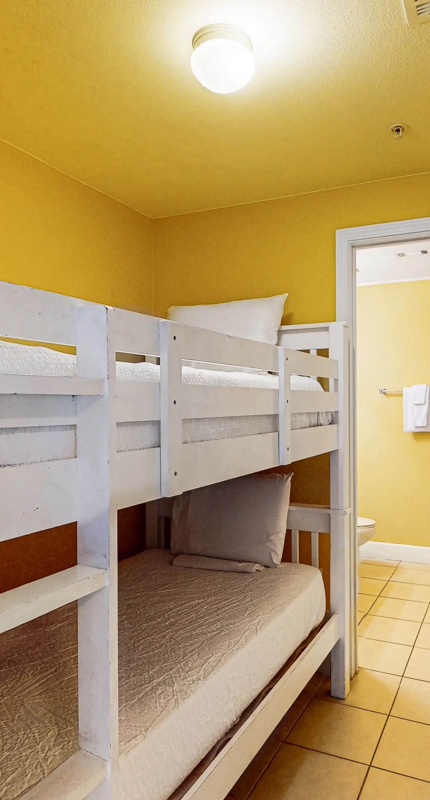 Gulf-front getaway with water views, pools, hot tub, game room & gym