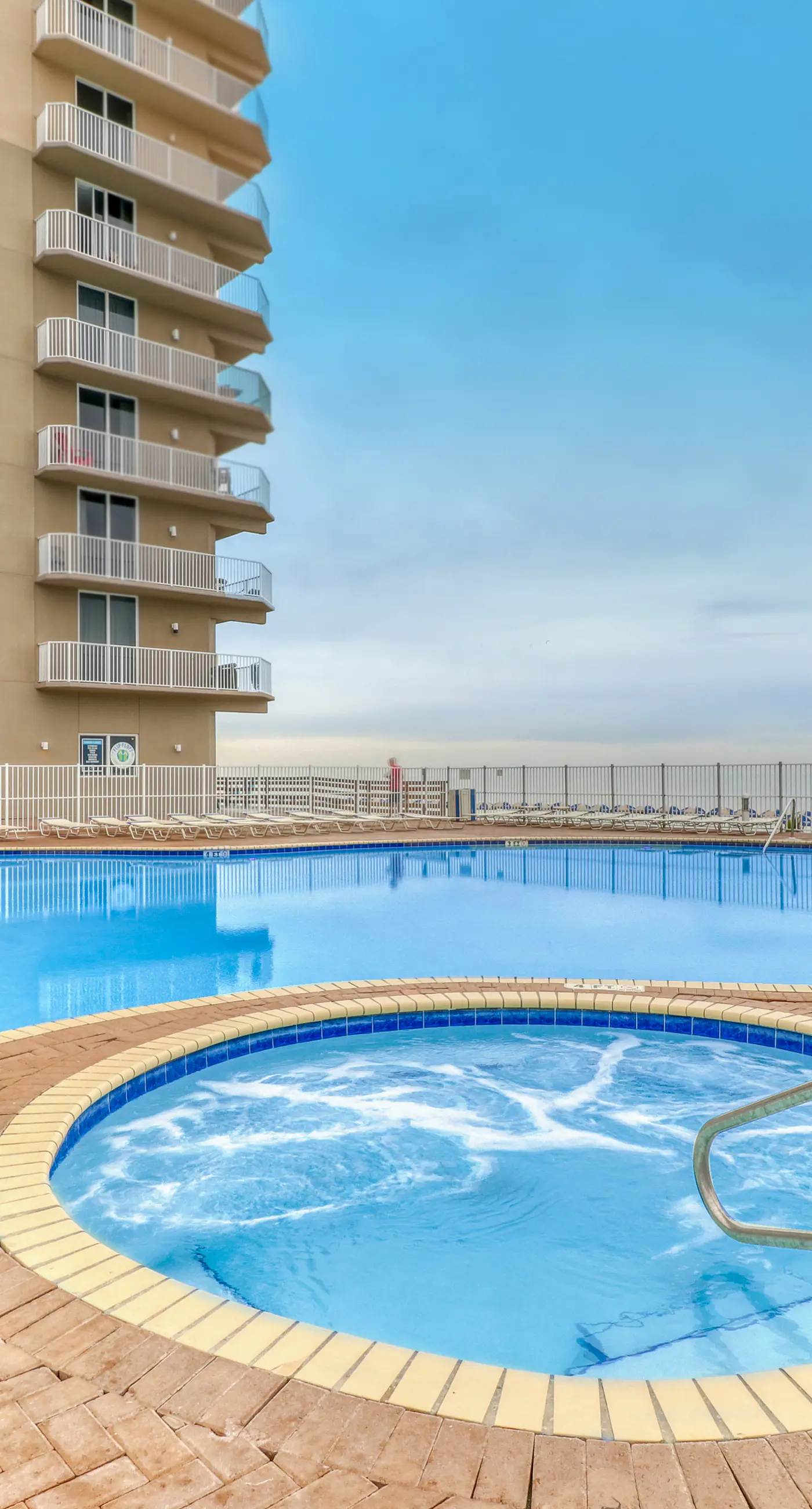 Serene beachfront condo with gulf views & resort pools, hot tubs, beach service