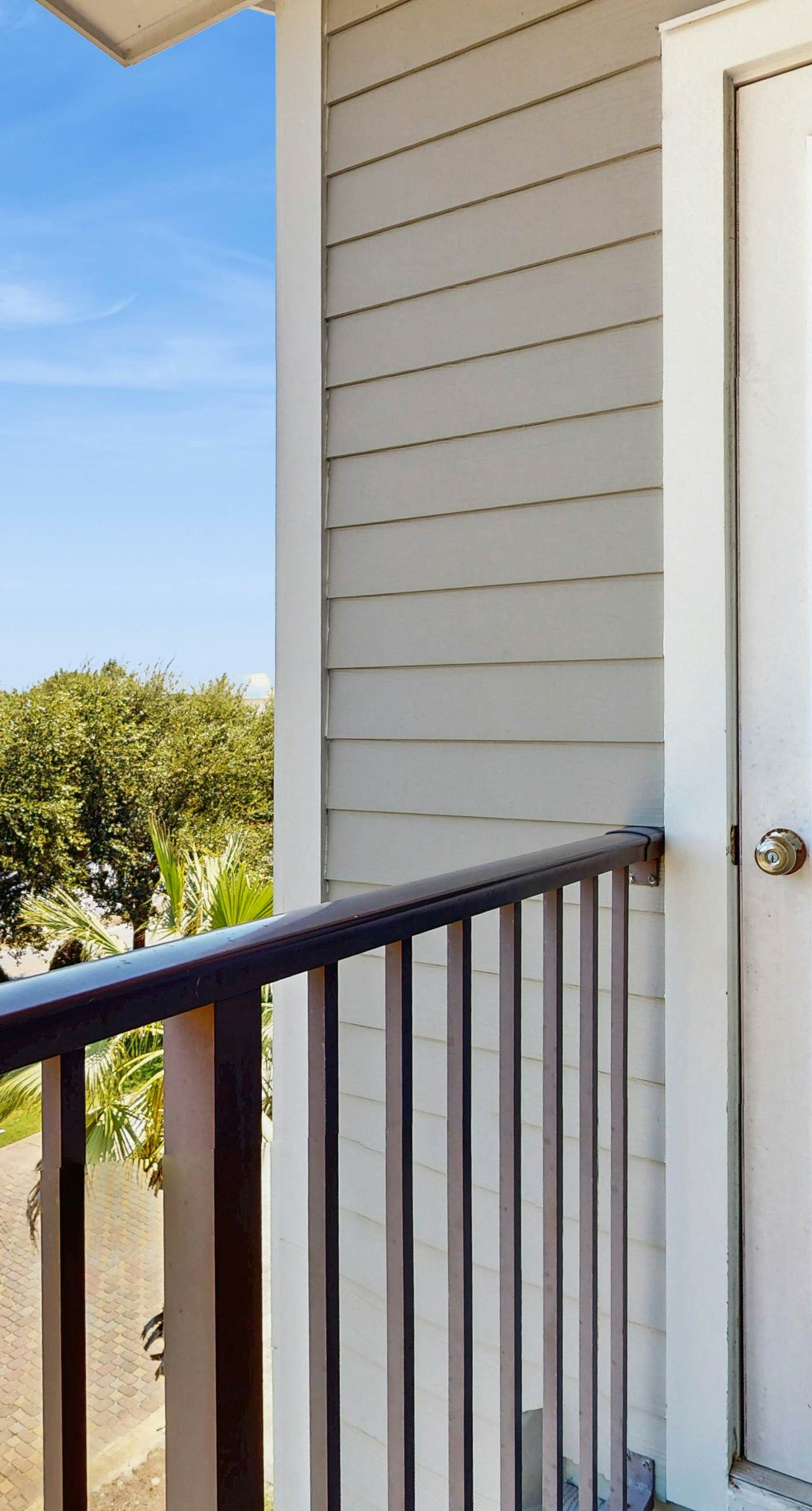 Spacious private home with patio, balconies, close to beaches & shared pool!