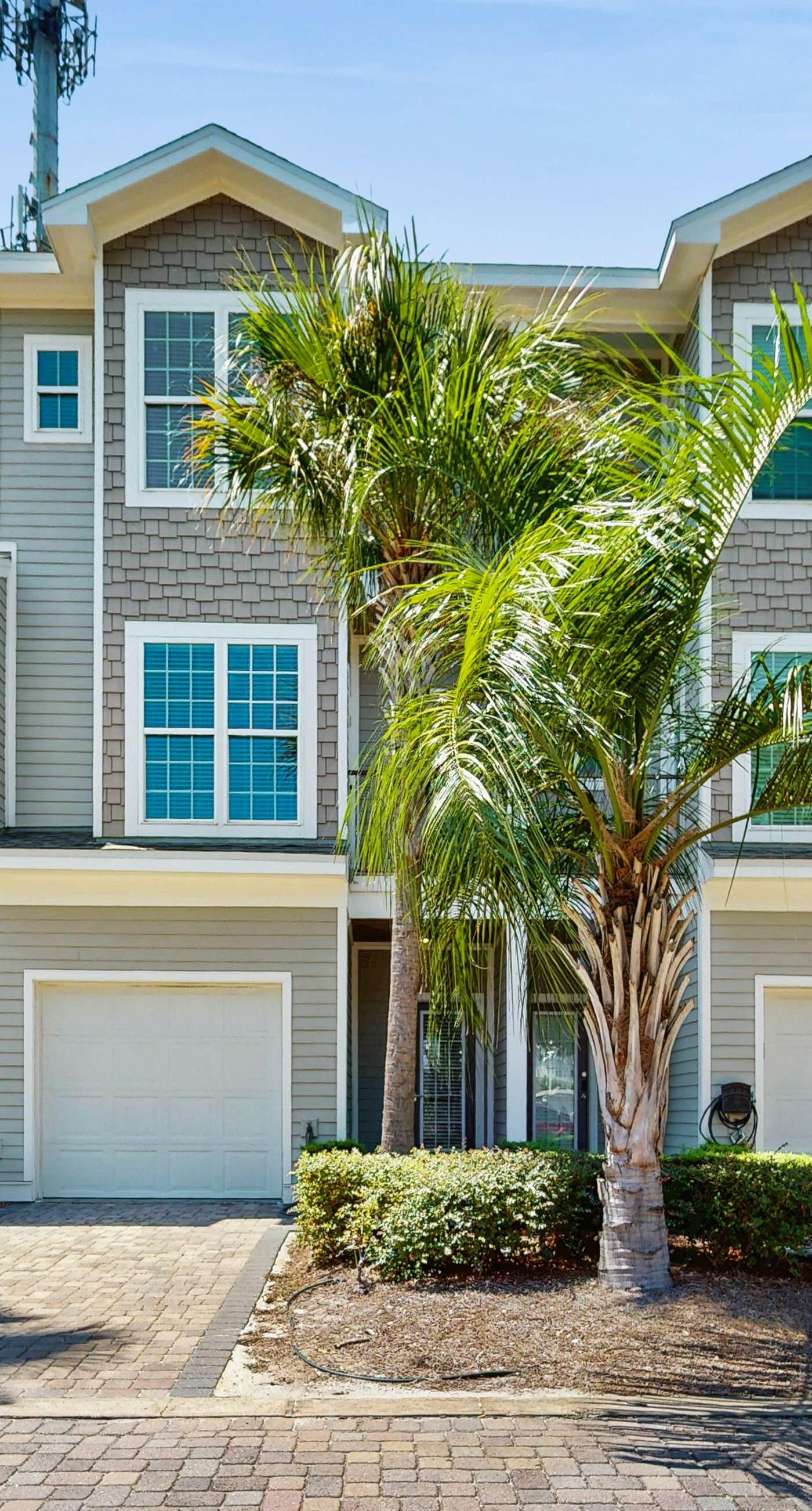 Spacious private home with patio, balconies, close to beaches & shared pool!