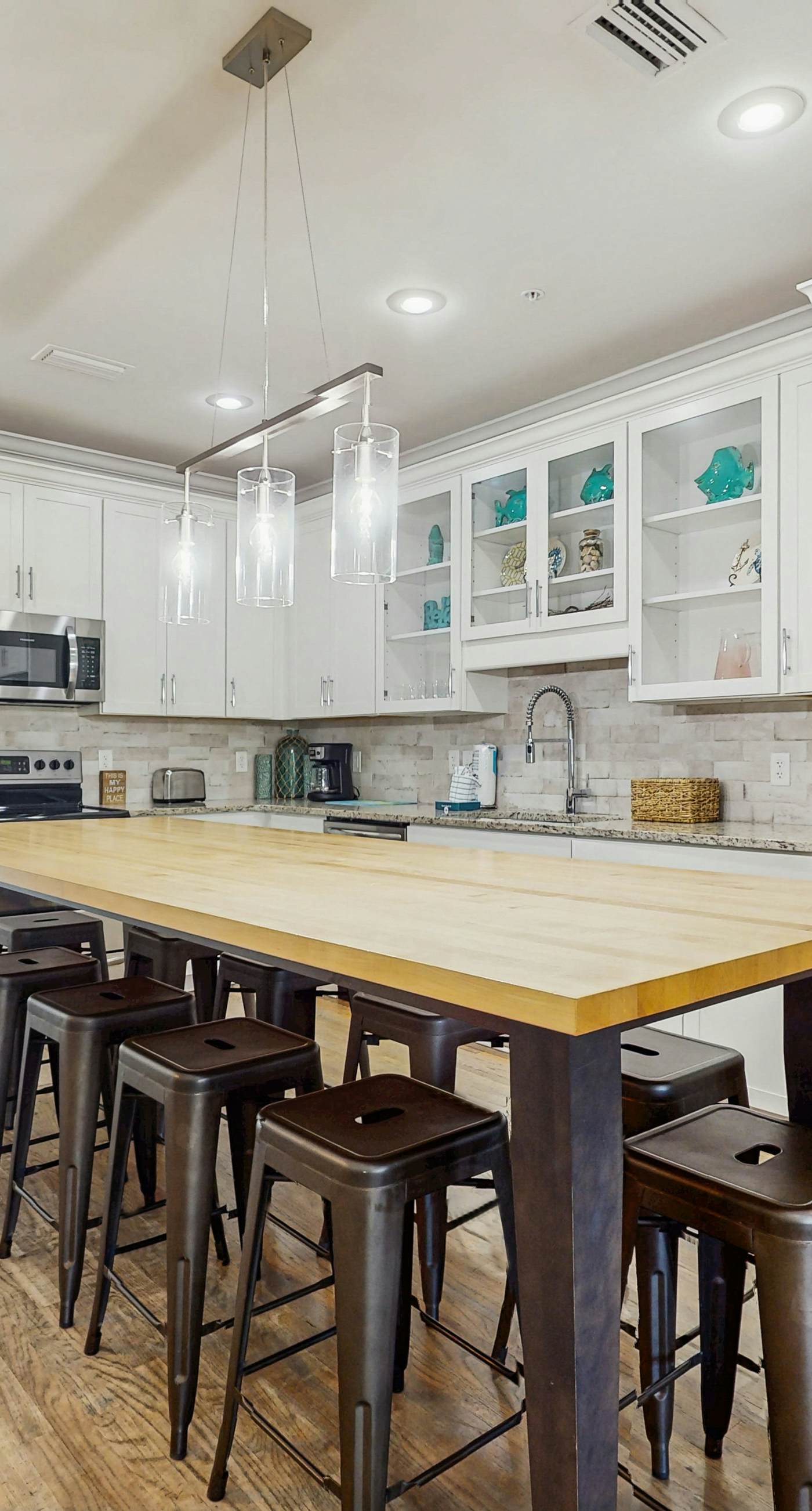 Spacious private home with patio, balconies, close to beaches & shared pool!