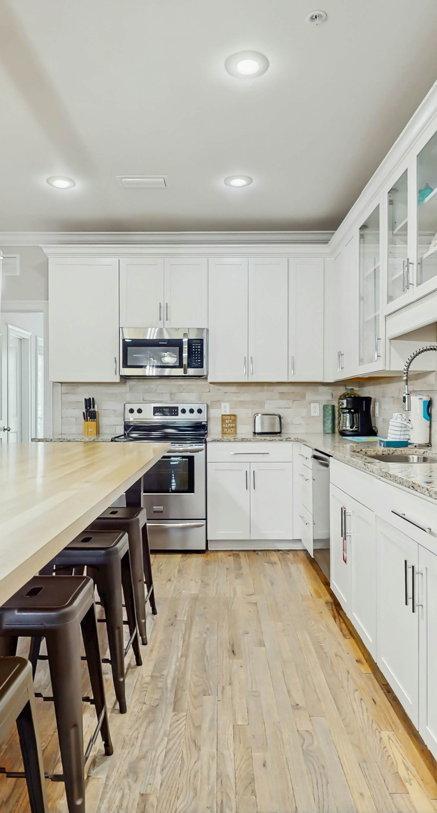 Spacious private home with patio, balconies, close to beaches & shared pool!