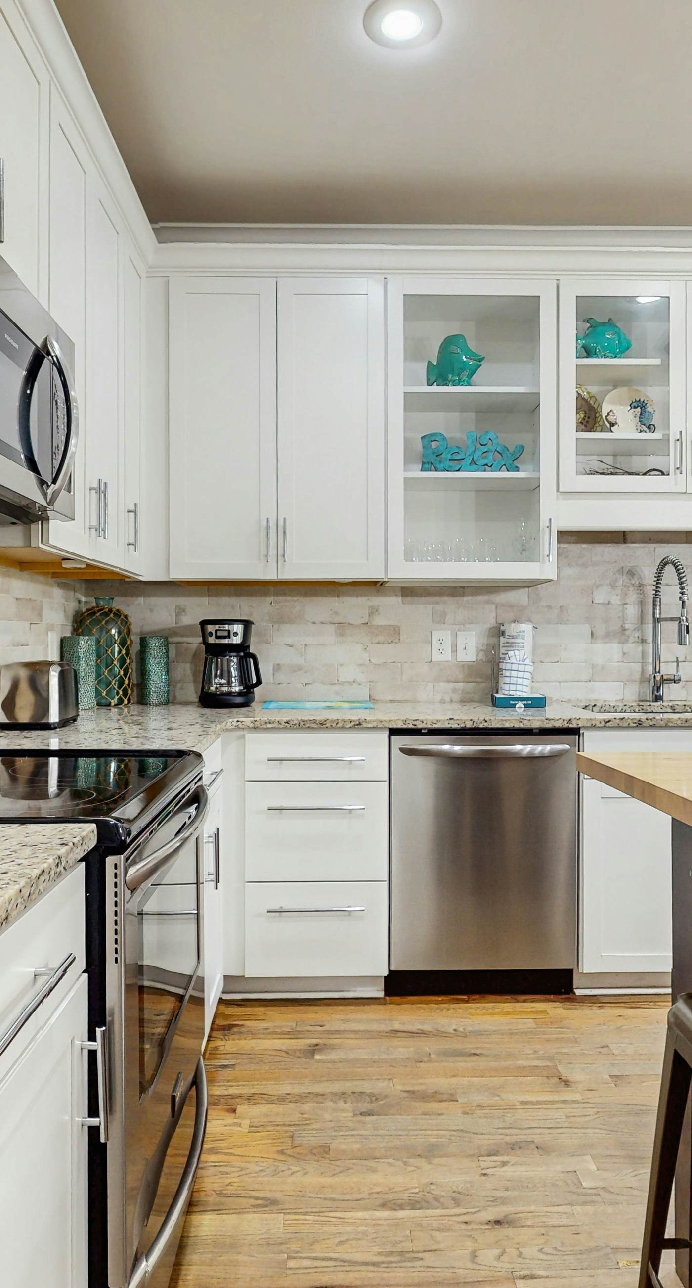 Spacious private home with patio, balconies, close to beaches & shared pool!