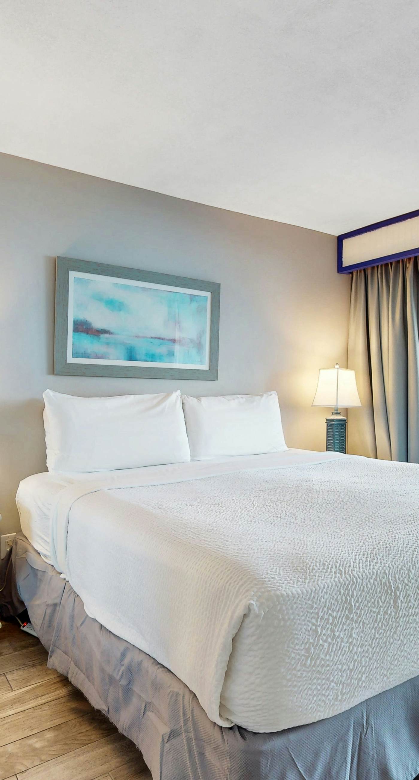 8th floor condo with Gulf views, balcony, pools, hot tubs, central AC, and WiFi