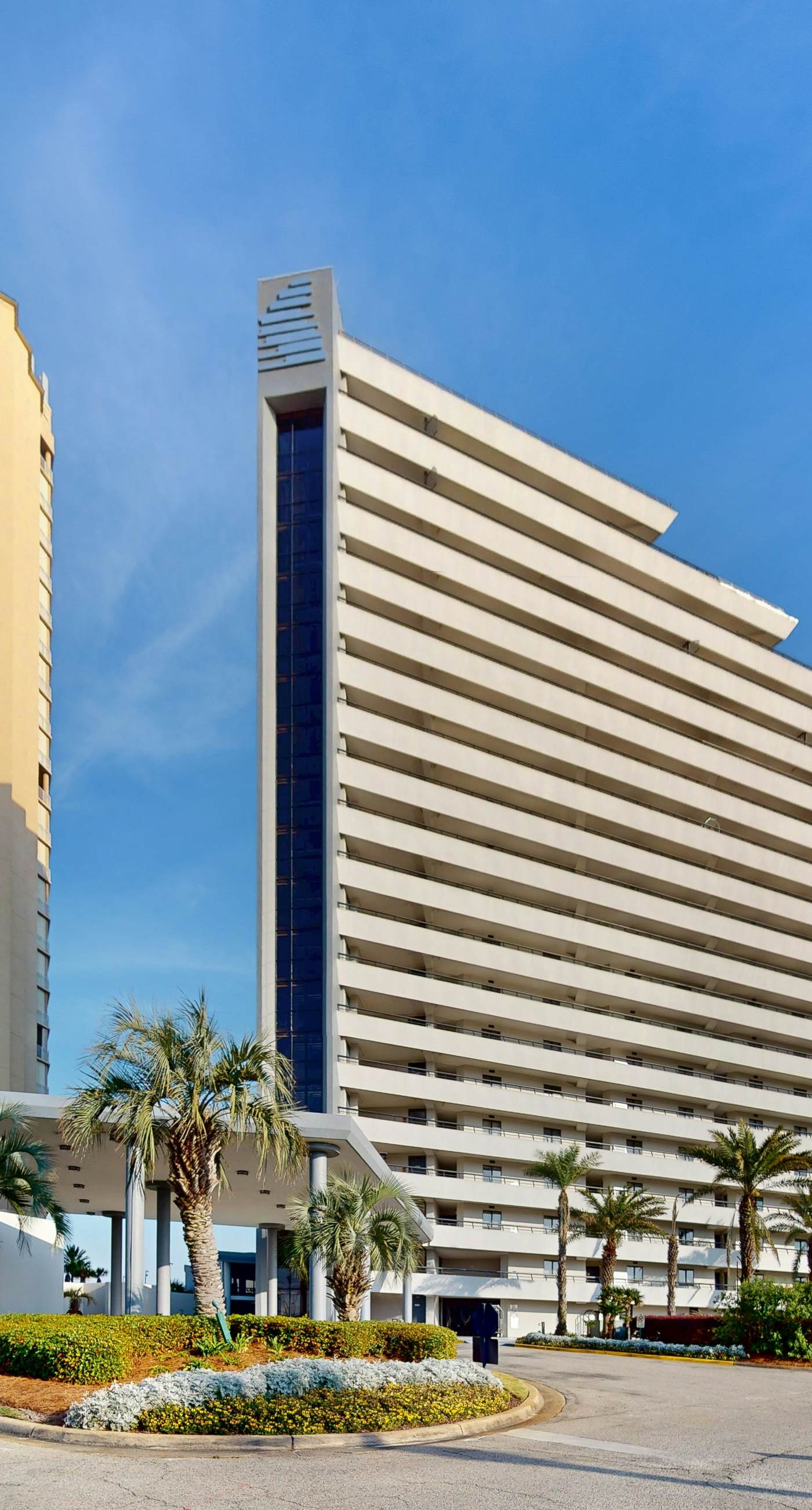 8th floor condo with Gulf views, balcony, pools, hot tubs, central AC, and WiFi