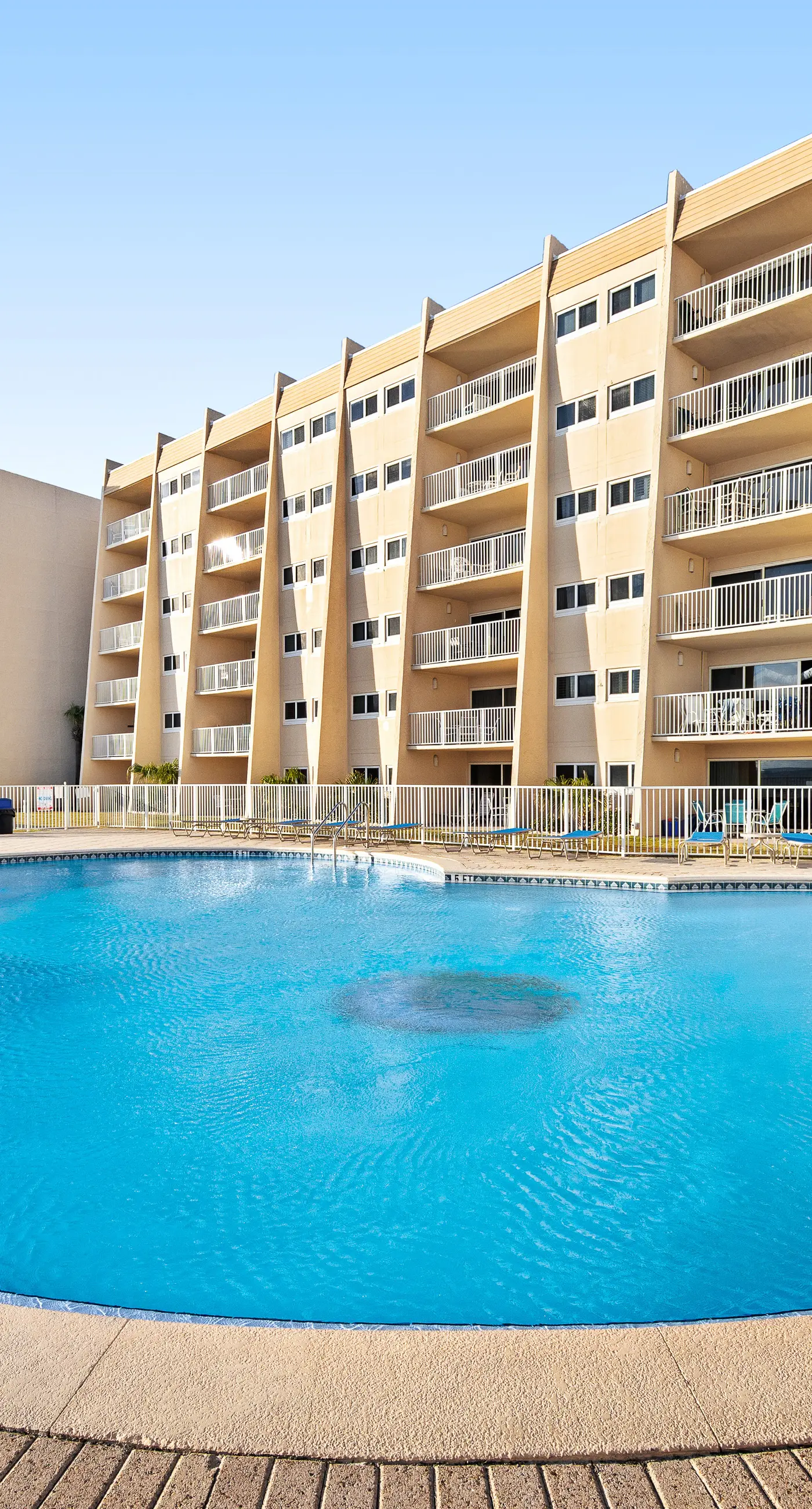 Oceanfront condo with heated pool, tennis, grilling station, & gym - balcony