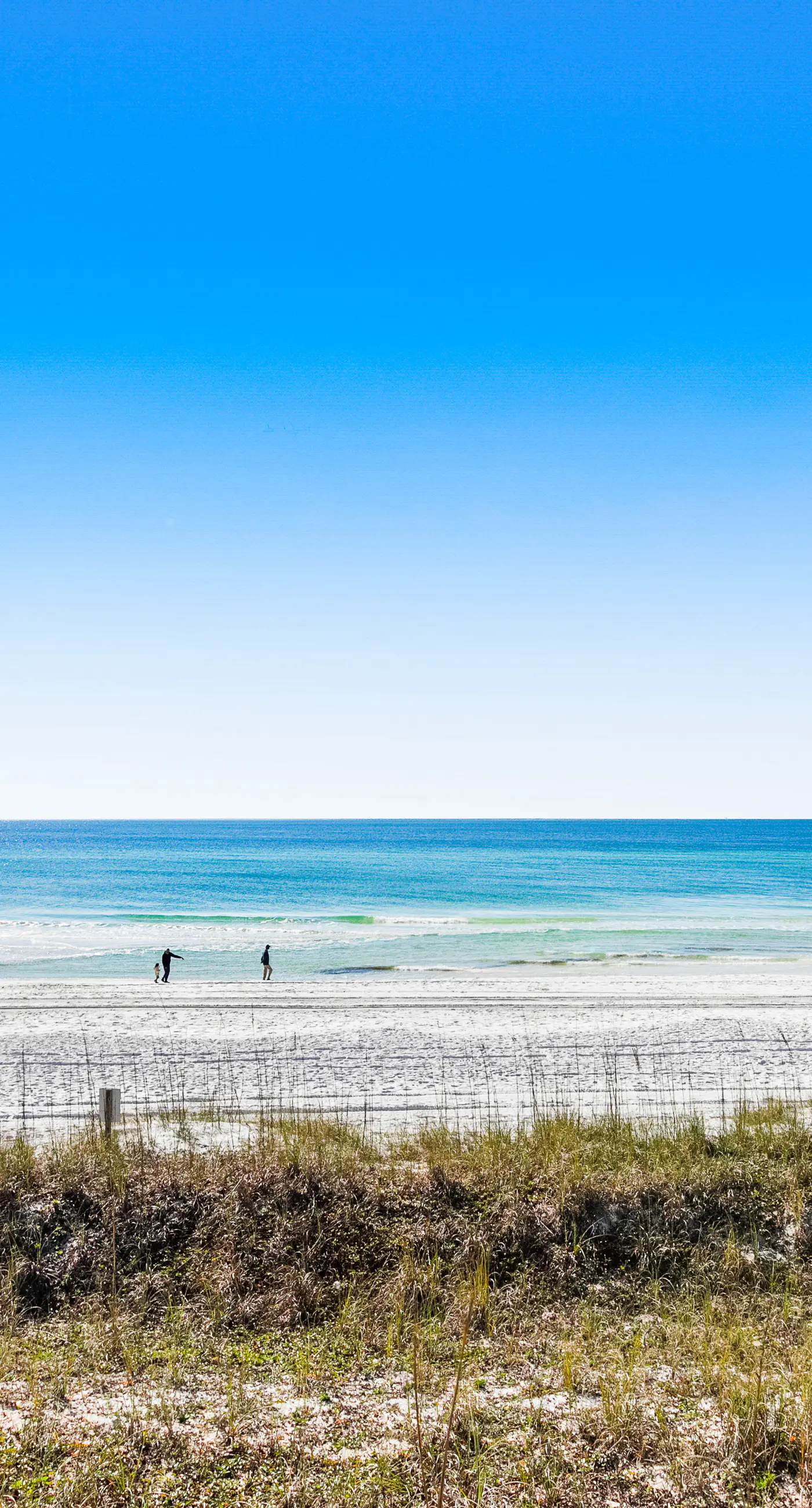 Condo with beach access, resort pools & relaxing balcony