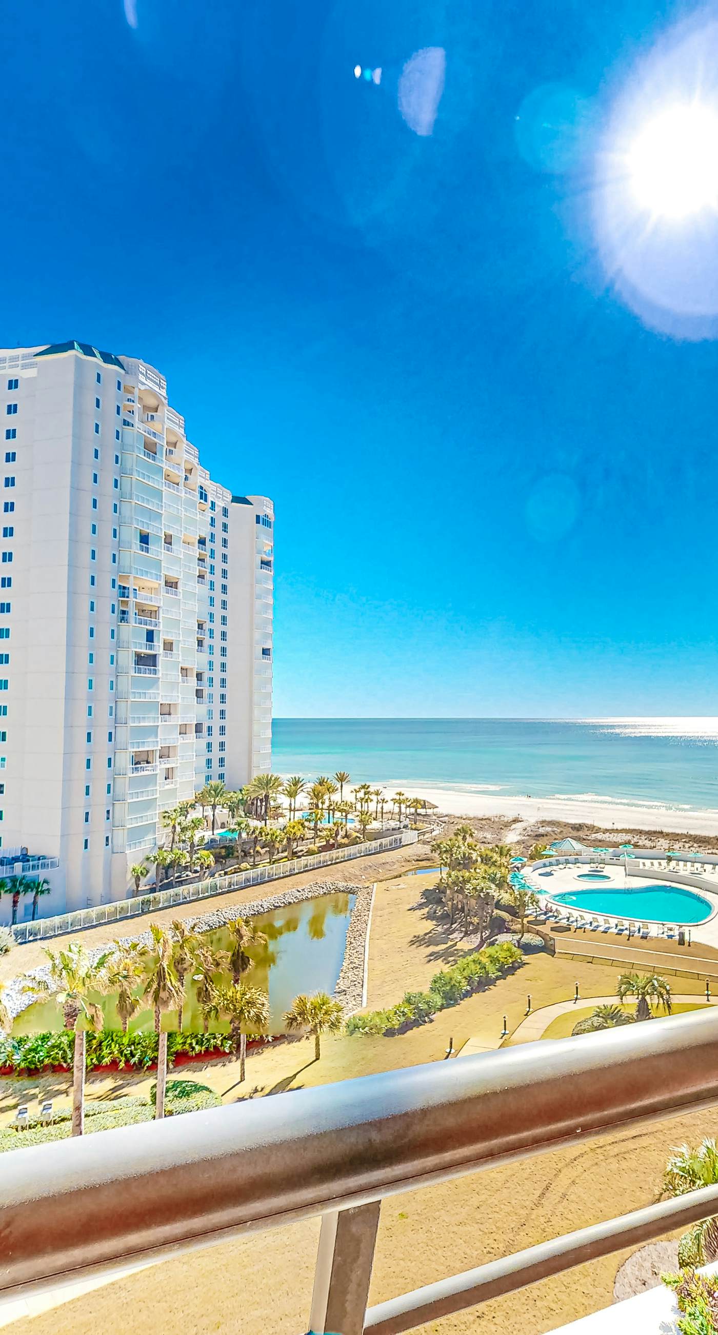 Gulf-front condo with HD flat-screen televisions Tiki bar & Sky bar on-site