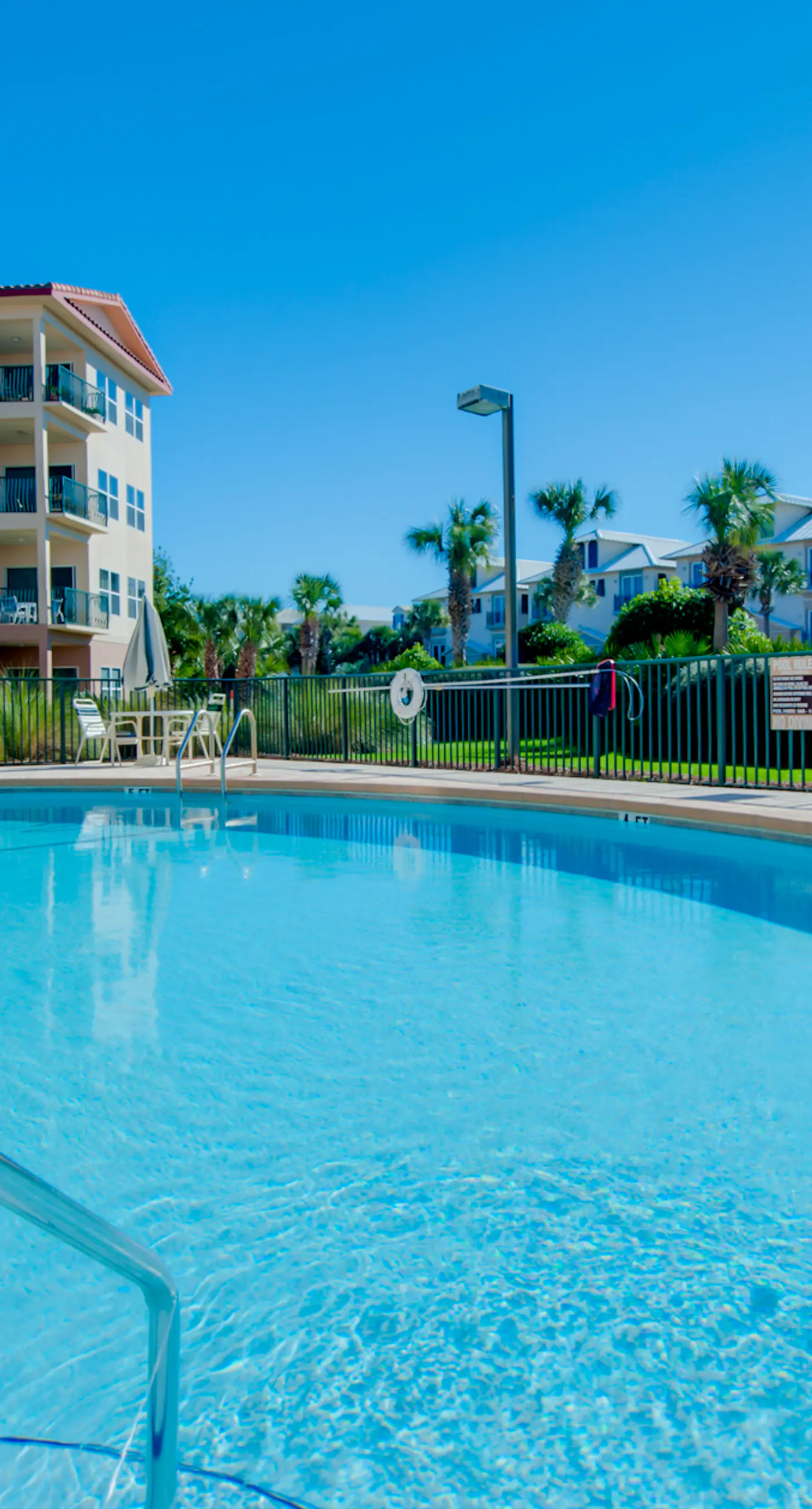 Updated ground floor beachside condo with private beach access & patio