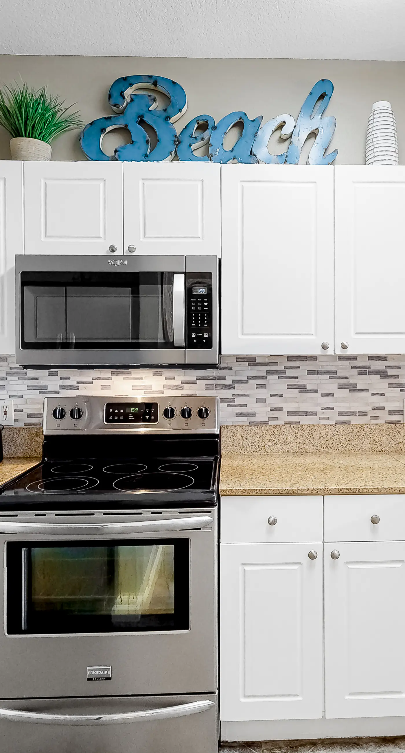 Updated ground floor beachside condo with private beach access & patio