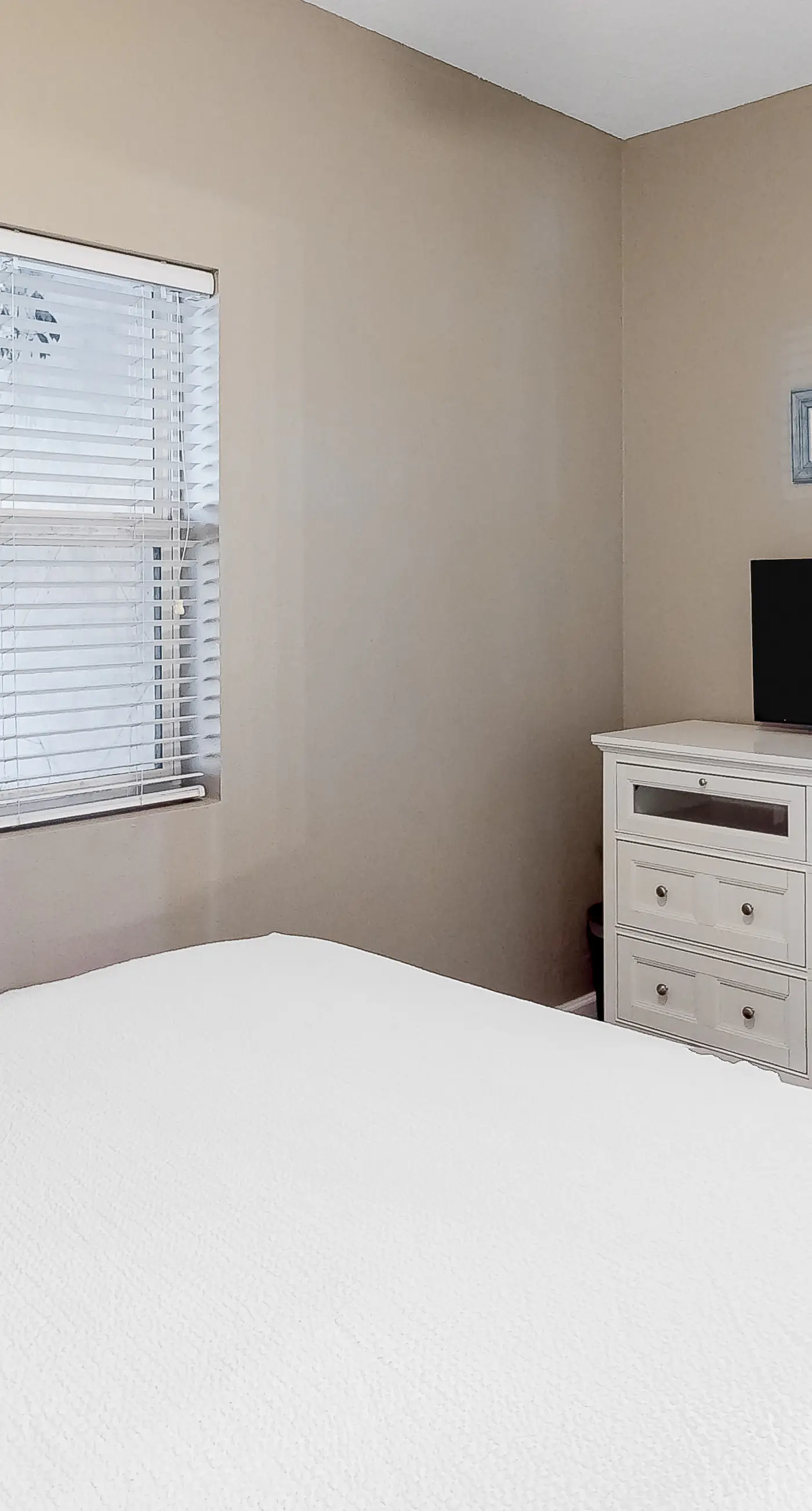 Updated ground floor beachside condo with private beach access & patio