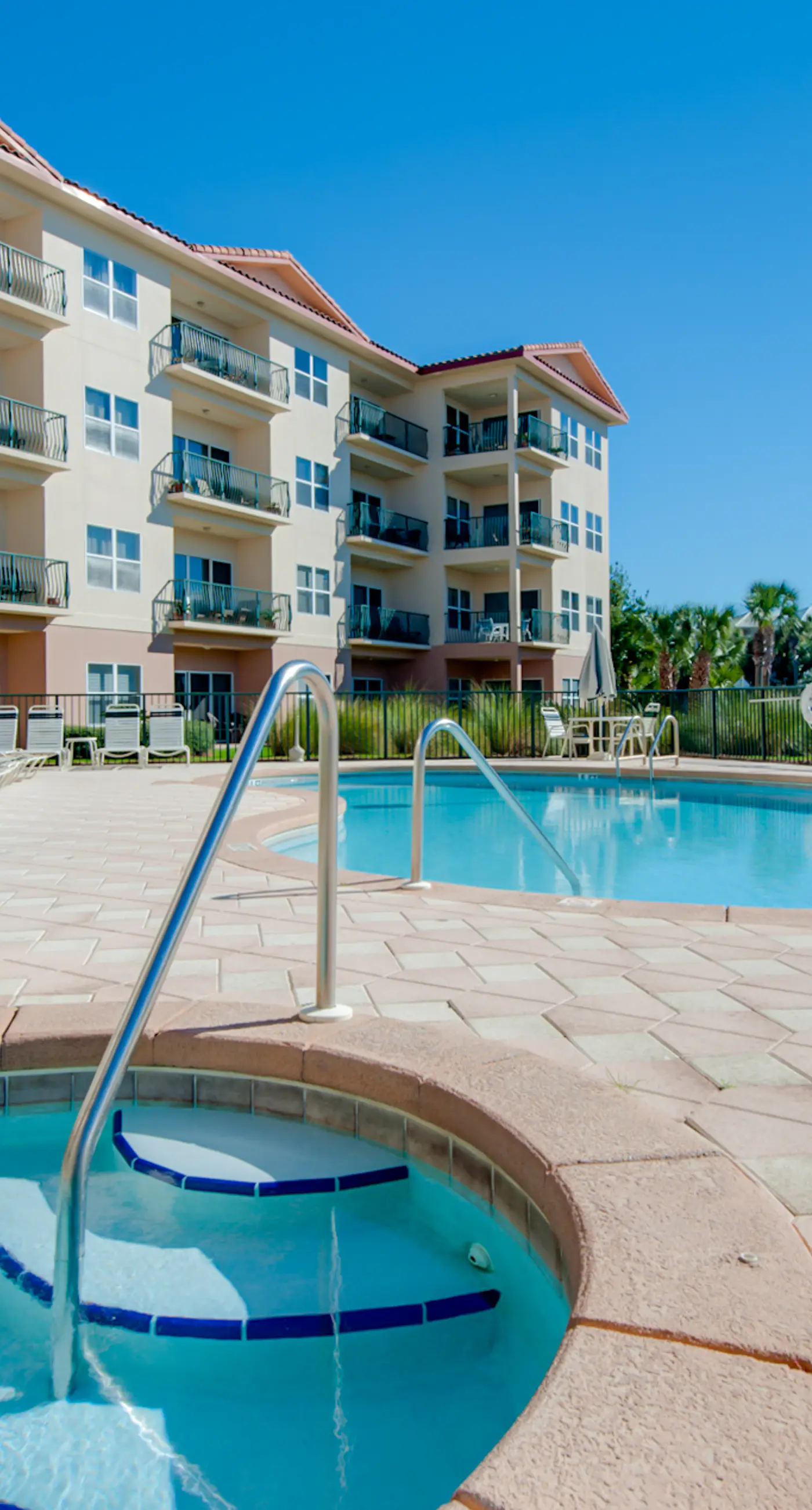 Updated ground floor beachside condo with private beach access & patio
