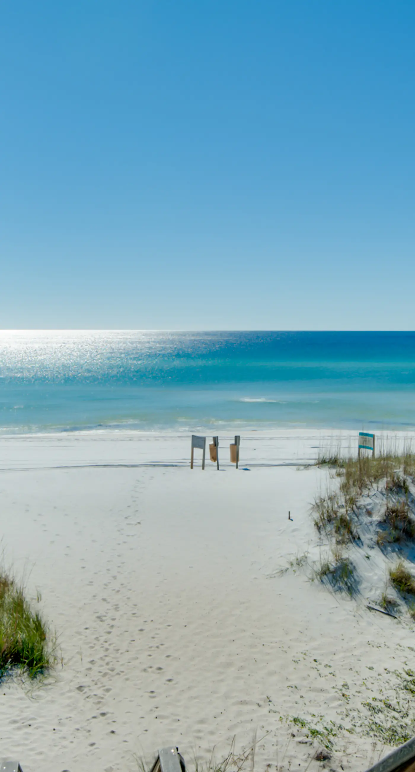 Updated ground floor beachside condo with private beach access & patio