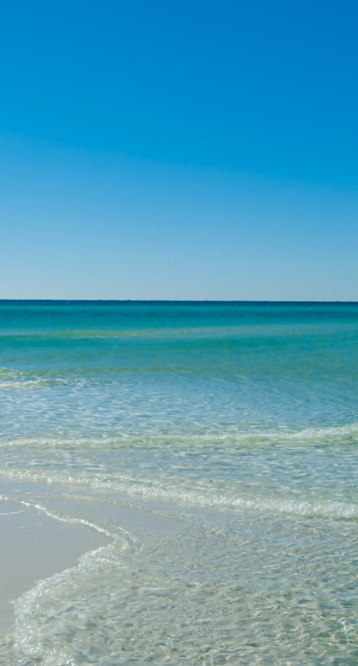 Updated ground floor beachside condo with private beach access & patio
